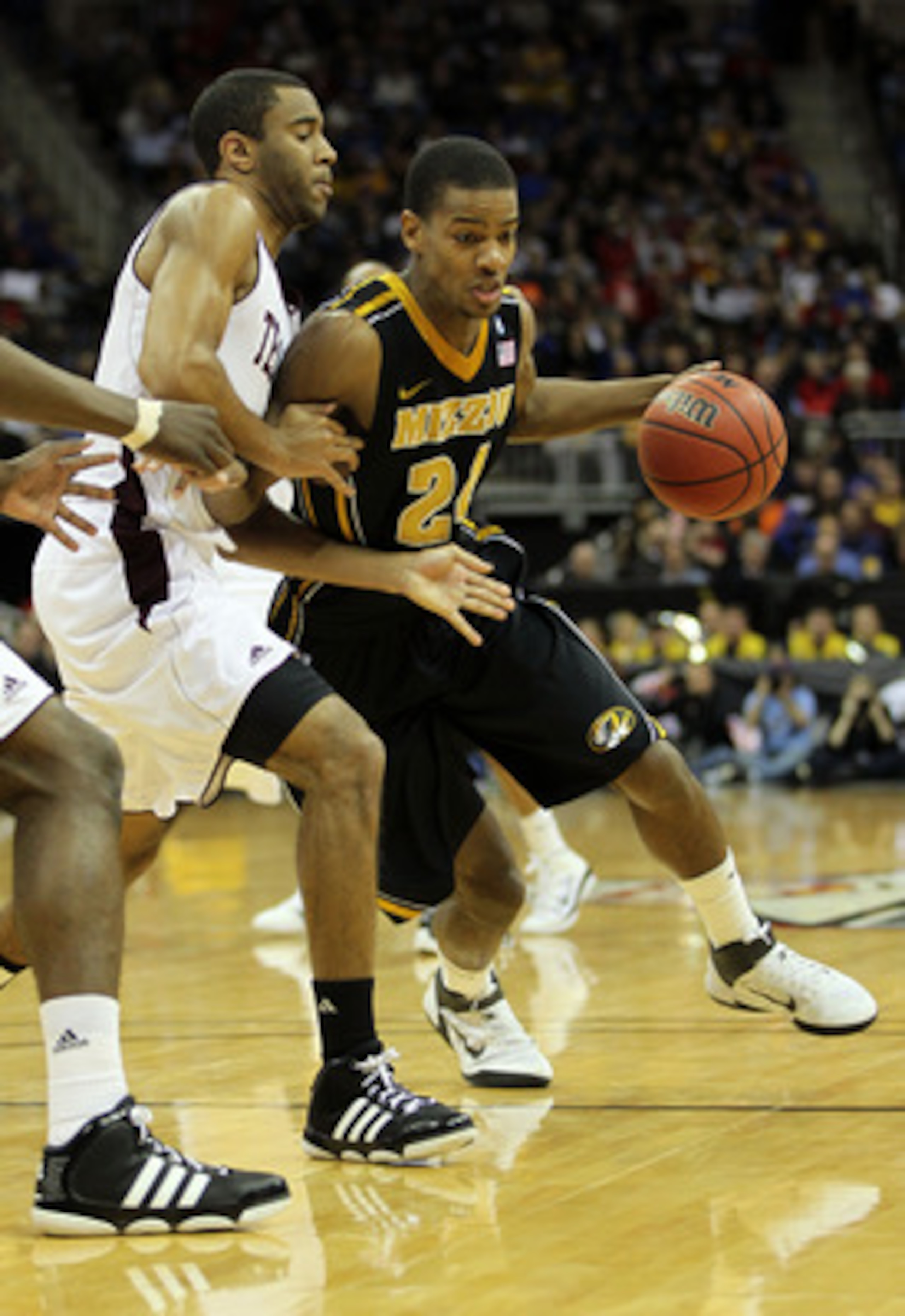KANSAS CITY, MO - MARCH 10:  Kim English #24 of the Missouri Tigers drives with the ball against the Texas A&M Aggies during their quarterfinal game in the 2011 Phillips 66 Big 12 Men's Basketball Tournament at Sprint Center on March 10, 2011 in Kansas Ci