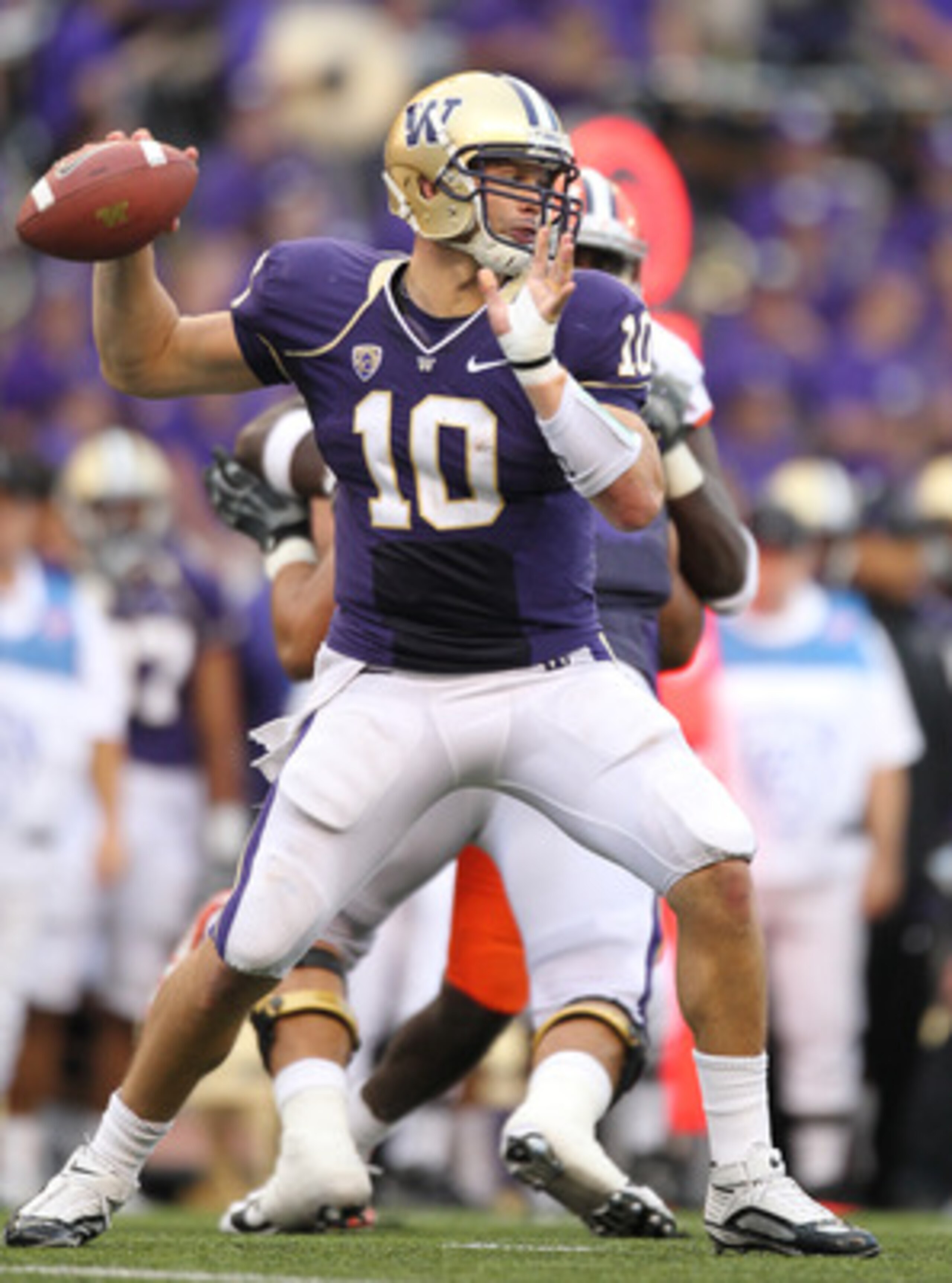 SEATTLE - SEPTEMBER 11:  Quarterback Jake Locker #10 of the Washington Huskies passes against the Syracuse Orange on September 11, 2010 at Husky Stadium in Seattle, Washington. (Photo by Otto Greule Jr/Getty Images)