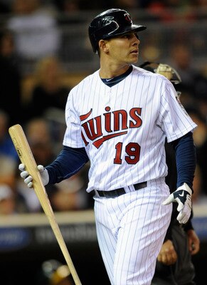 MINNEAPOLIS, MN - APRIL 9: Danny Valencia #19 of the Minnesota Twins reacts to a strikeout against the Oakland Athletics during the seventh inning of their game on April 9, 2011 at Target Field in Minneapolis, Minnesota. Athletics defeated the Twins 1-0.