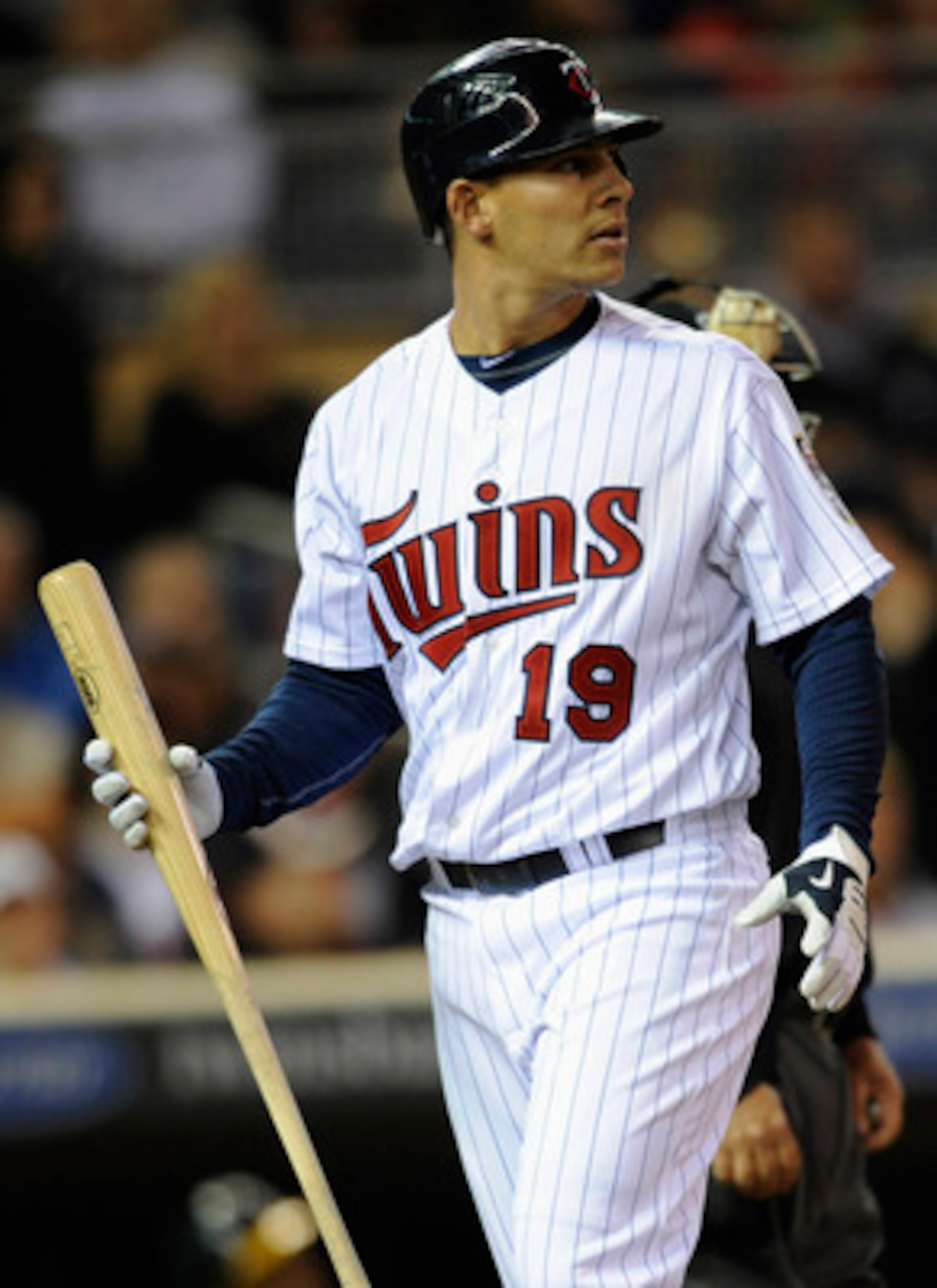 MINNEAPOLIS, MN - APRIL 9: Danny Valencia #19 of the Minnesota Twins reacts to a strikeout against the Oakland Athletics during the seventh inning of their game on April 9, 2011 at Target Field in Minneapolis, Minnesota. Athletics defeated the Twins 1-0.