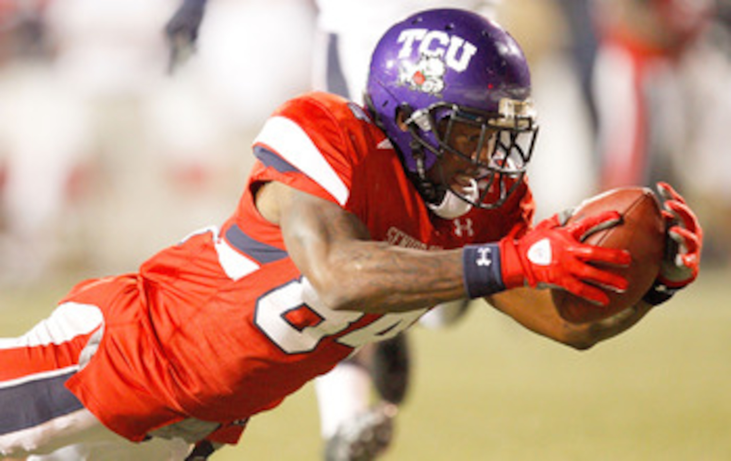 MOBILE, AL - JANUARY 29:  Wide receiiver Jeremy Kerley #84 of the South Team dives into the endzone while scoring on a touchdown pass against the North Team during the fourth quarter of the Under Armour Senior Bowl on January 29, 2011 at Ladd-Pebbles Stad