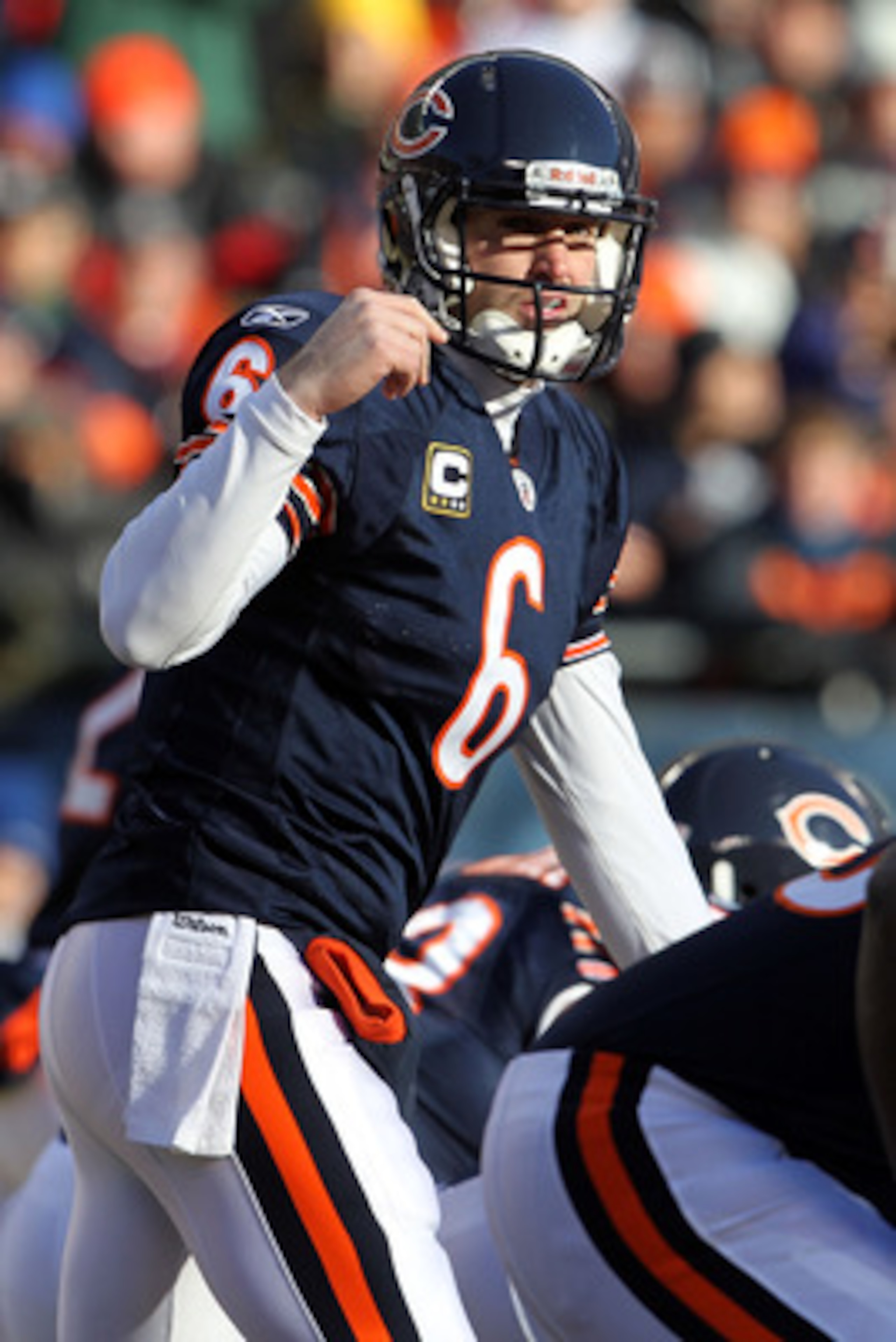 CHICAGO, IL - JANUARY 23:  Quarterback Jay Cutler #6 of the Chicago Bears under center while taking on the Green Bay Packers in the NFC Championship Game at Soldier Field on January 23, 2011 in Chicago, Illinois.  (Photo by Jamie Squire/Getty Images)
