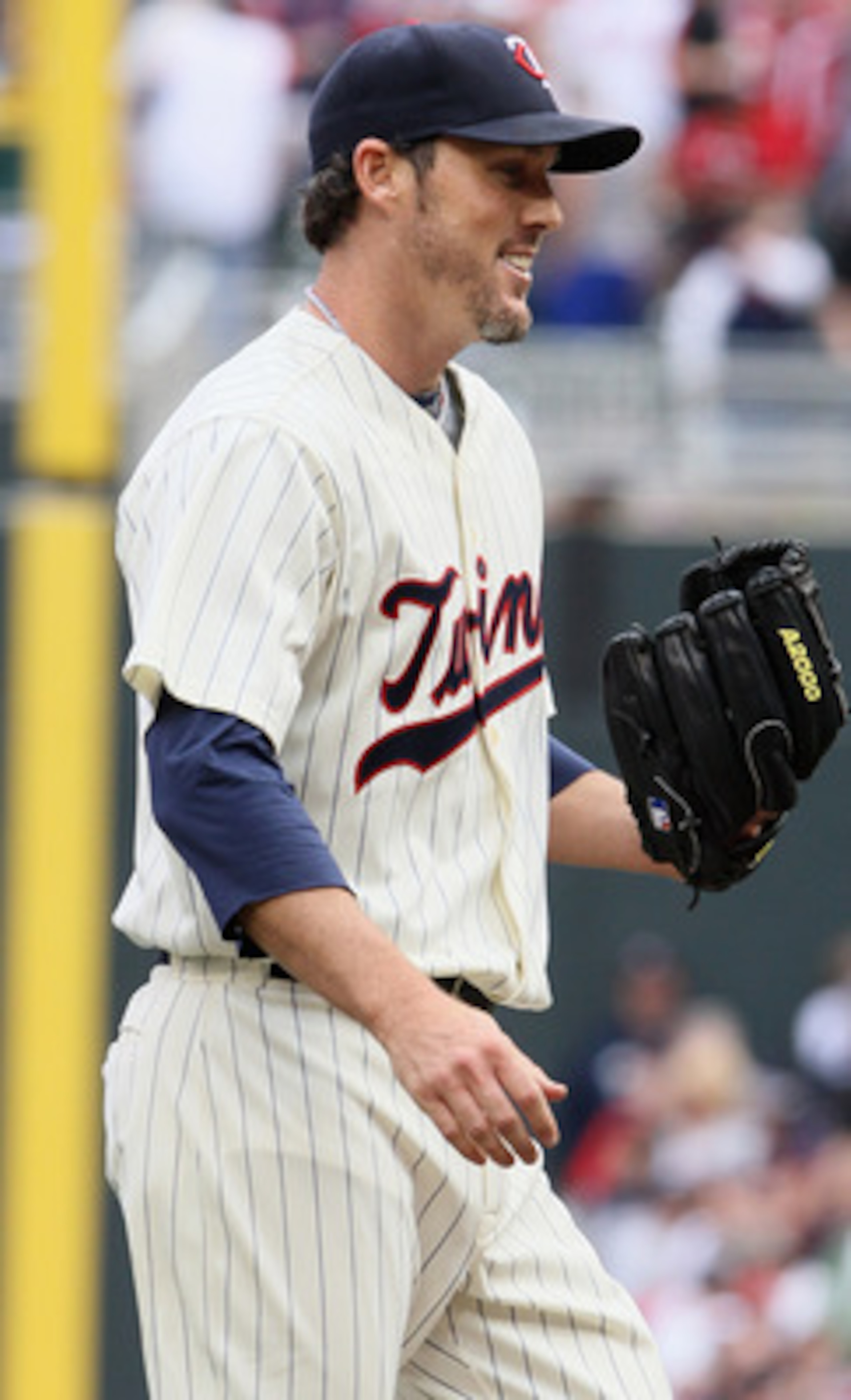 MINNEAPOLIS, MN - APRIL 08:  Closing pitcher Joe Nathan #36 of the Minnesota Twins celebrates the win during Opening Day on April 8, 2011 at Target Field in Minneapolis, Minnesota. The Minnesota Twins defeated the Oakland Athletics 2-1.  (Photo by Elsa/Ge