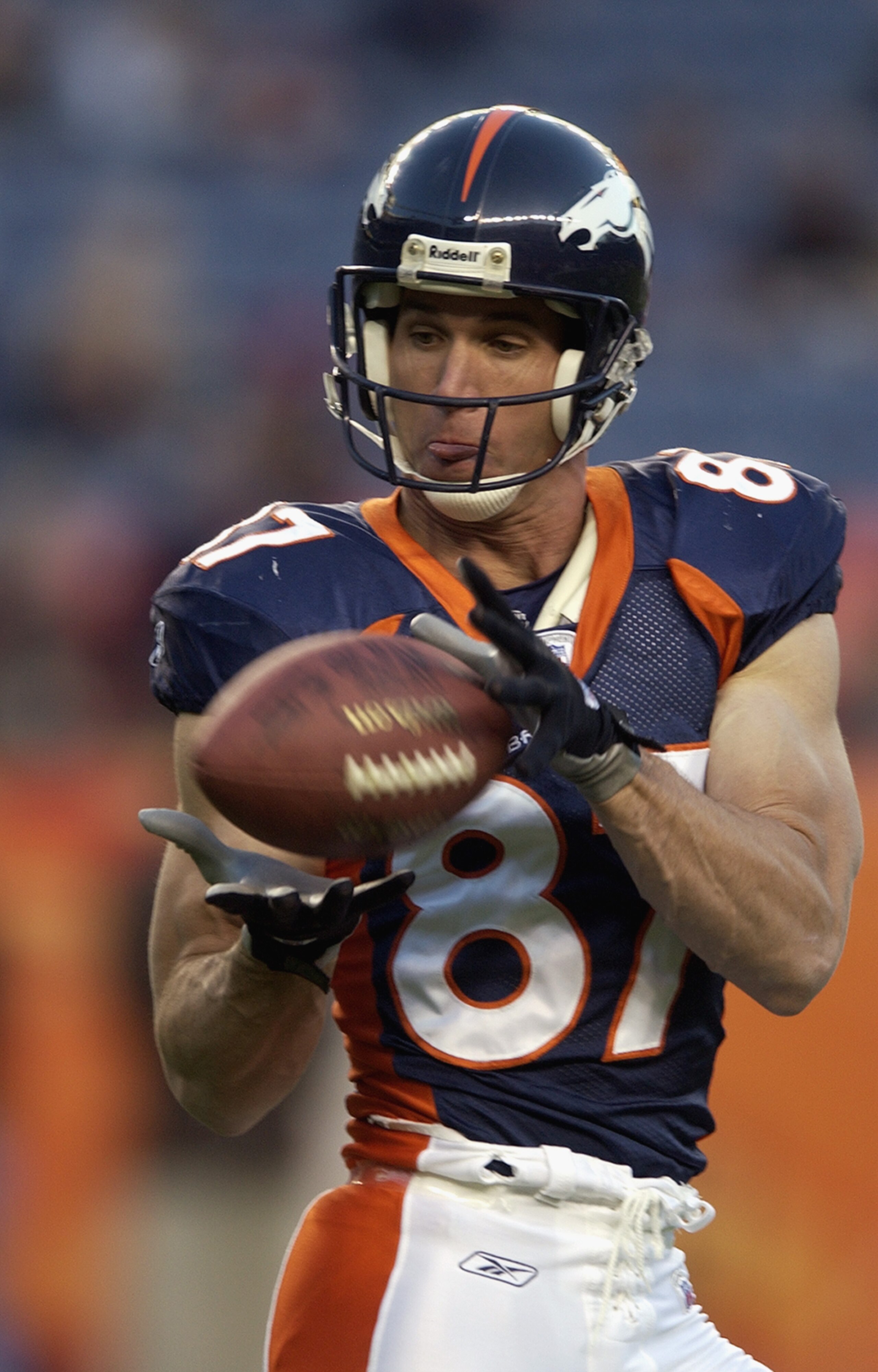 DENVER - OCTOBER 13:  Ed McCaffrey #87 of the Denver Broncos before a game against the Miami Dolphins on October 13, 2002 at INVESCO Field at Mile High in Denver, Colorado. The Dolphins defeated the Broncos 24-22. (Photo by Josh Merwin/Getty Images)