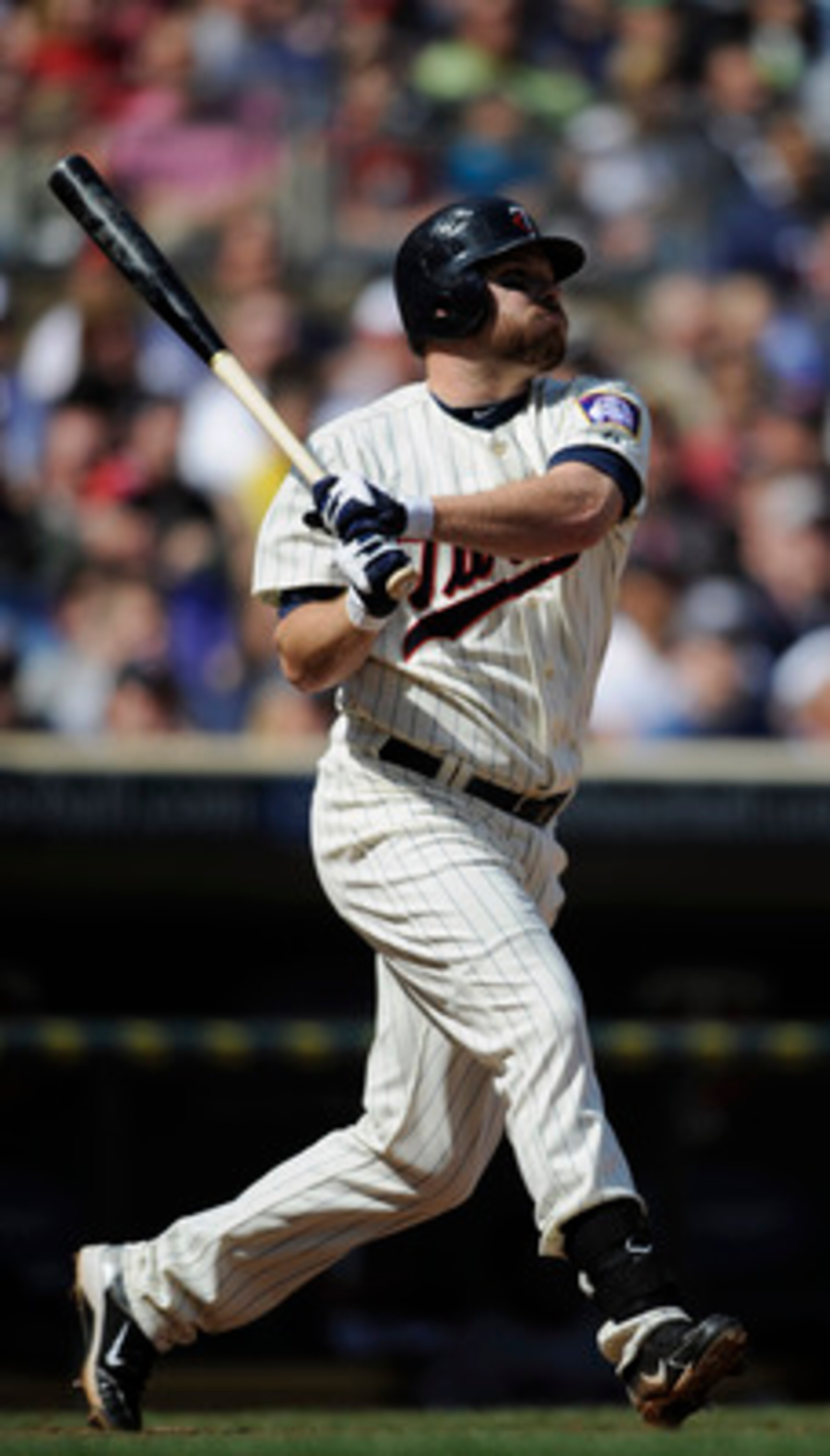 MINNEAPOLIS, MN - APRIL 24: Jason Kubel #16 of the Minnesota Twins hits a two-run double against the Cleveland Indians during the seventh inning of their game on April 24, 2011 at Target Field in Minneapolis, Minnesota. Twins defeated the Indians 4-3. (Ph
