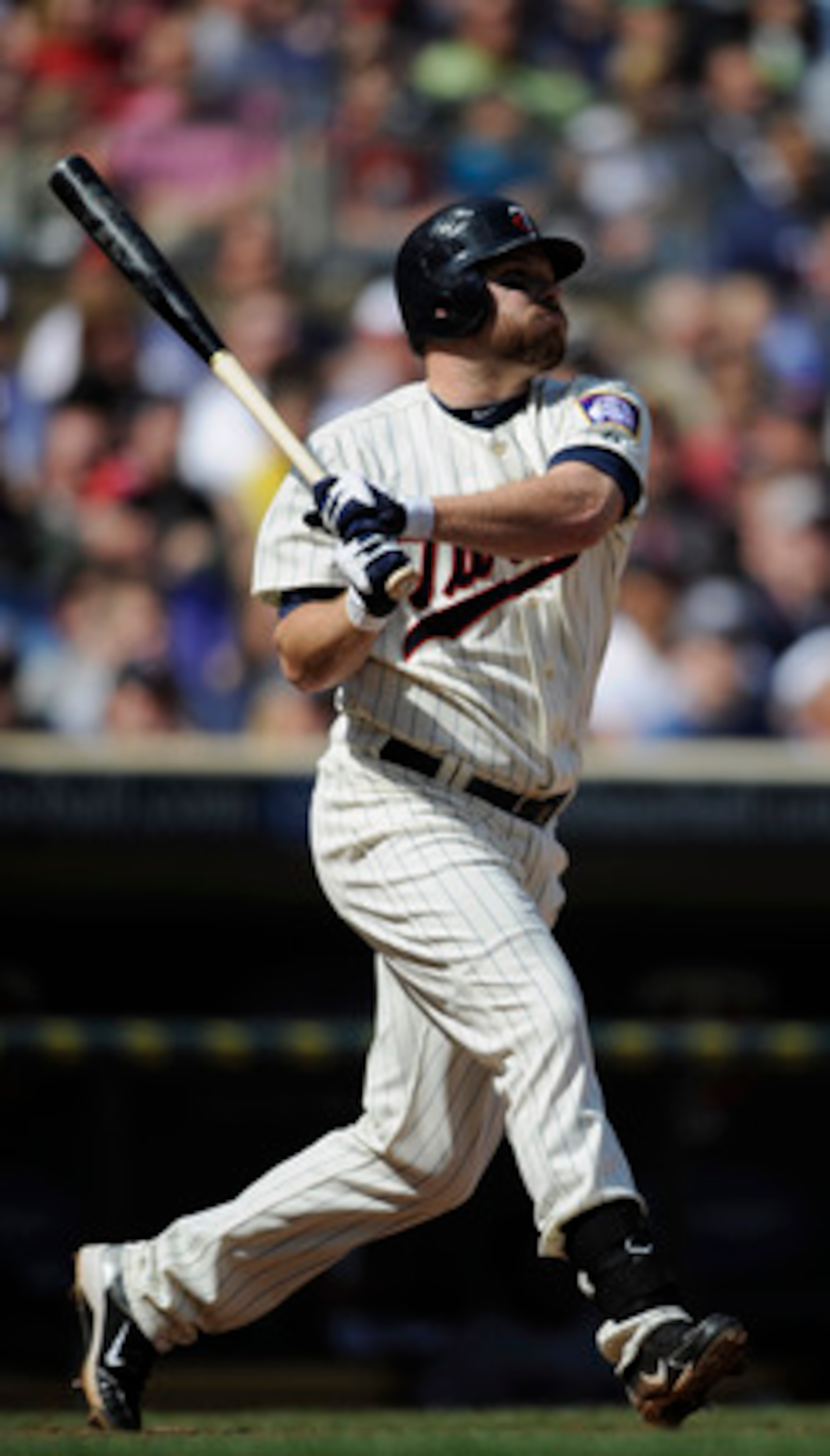 MINNEAPOLIS, MN - APRIL 24: Jason Kubel #16 of the Minnesota Twins hits a two-run double against the Cleveland Indians during the seventh inning of their game on April 24, 2011 at Target Field in Minneapolis, Minnesota. Twins defeated the Indians 4-3. (Ph