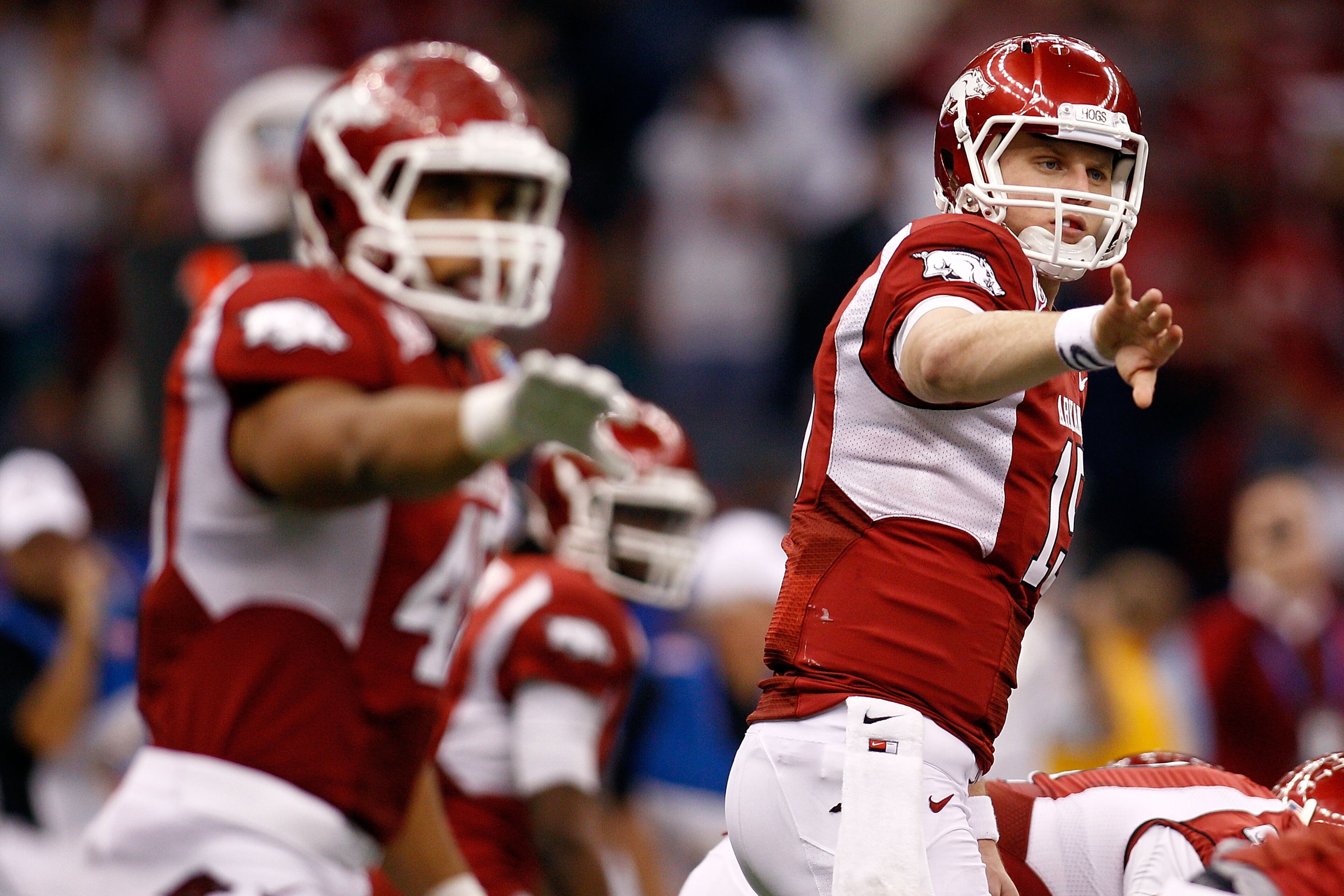 NEW ORLEANS, LA - JANUARY 04:  (R) Ryan Mallett #15 of the Arkansas Razorbacks calls out alongside Jarius Wright #4 against the Ohio State Buckeyes during the Allstate Sugar Bowl at the Louisiana Superdome on January 4, 2011 in New Orleans, Louisiana.  (P