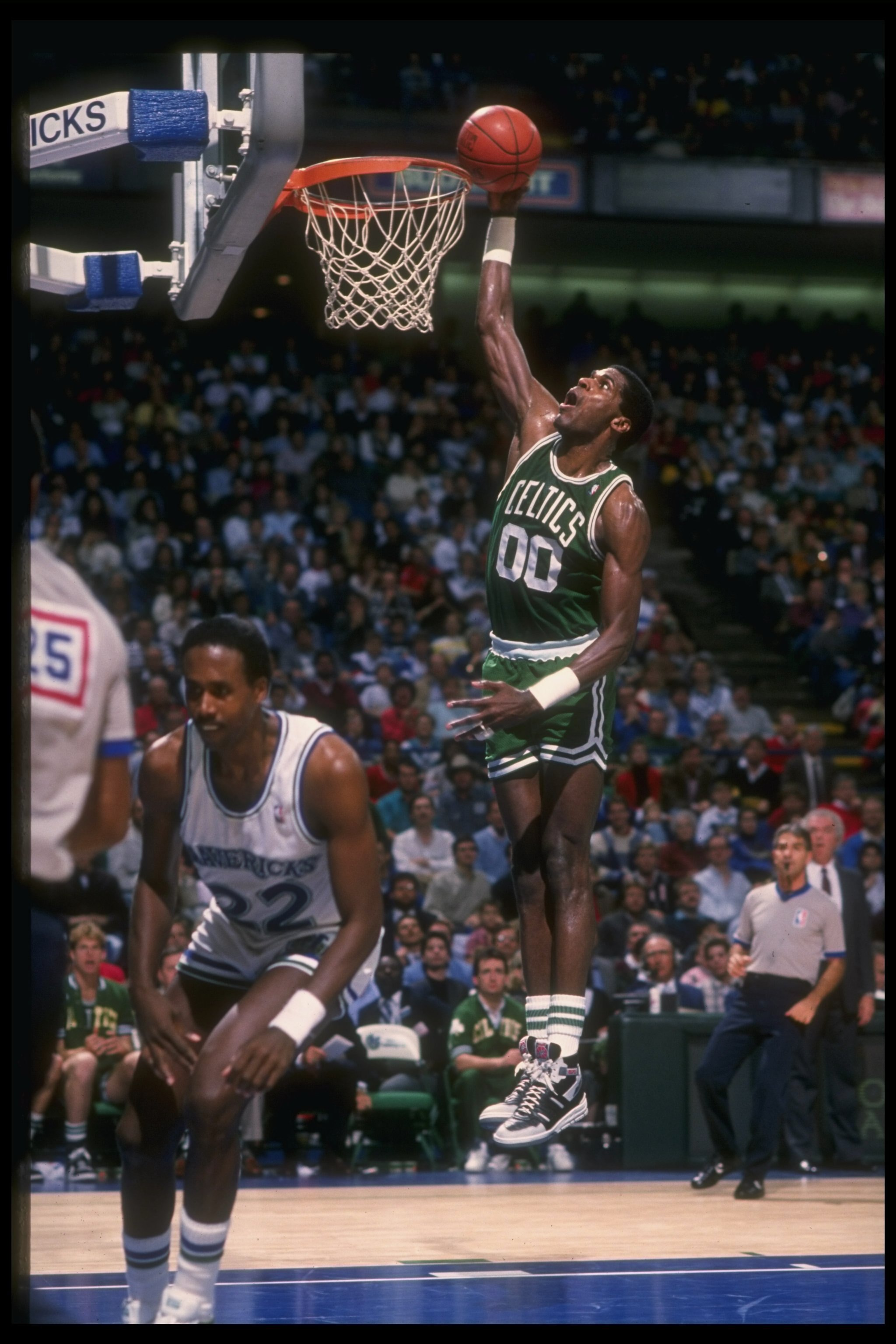 Undated:  Robert Parish of the Boston Celtics goes up for two during a game. Mandatory Credit: Otto Greule Jr.  /Allsport
