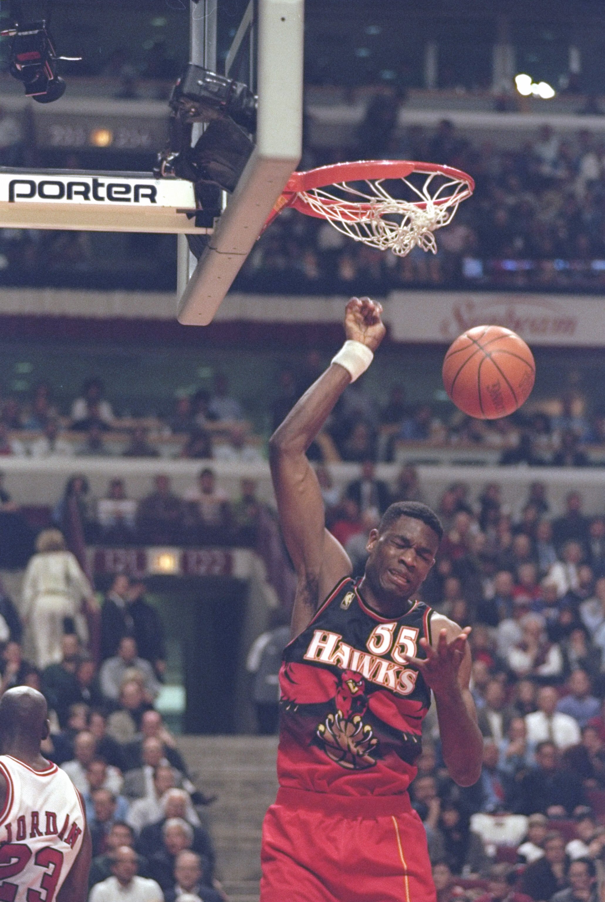 13 May 1997:  Center Dikembe Mutombo of the Atlanta Hawks slam dunks the ball during a playoff game against the Chicago Bulls at the United Center in Chicago, Illinois.  The Bulls won the game 107-92. Mandatory Credit: Jonathan Daniel  /Allsport