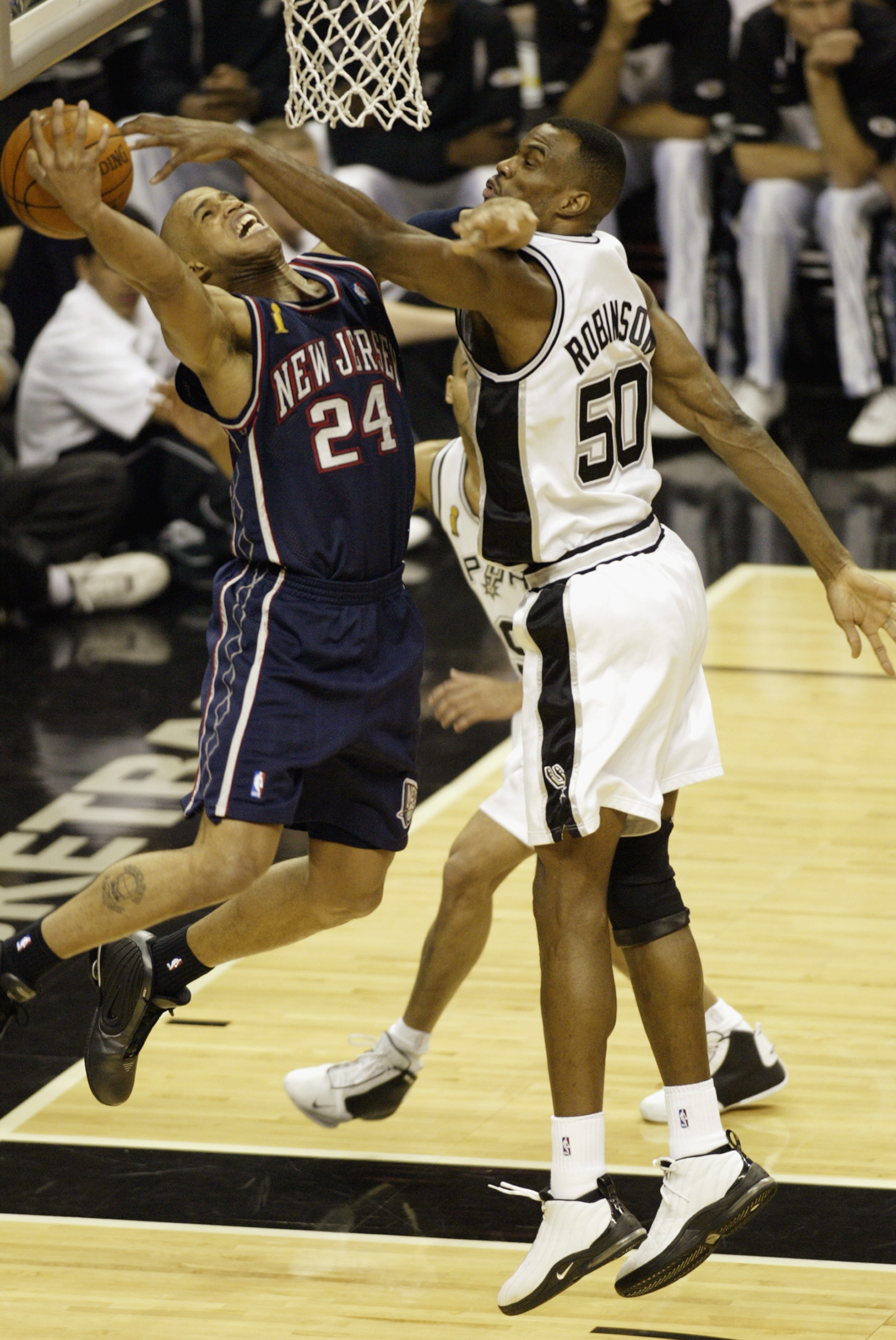 SAN ANTONIO - JUNE 6:  Richard Jefferson #24 of the New Jersey Nets shoots against the David Robinson #50 of the San Antonio Spurs during Game two of the 2003 NBA Finals at SBC Center on June 6, 2003 in San Antonio, Texas.  The Nets won 87-85.  NOTE TO US