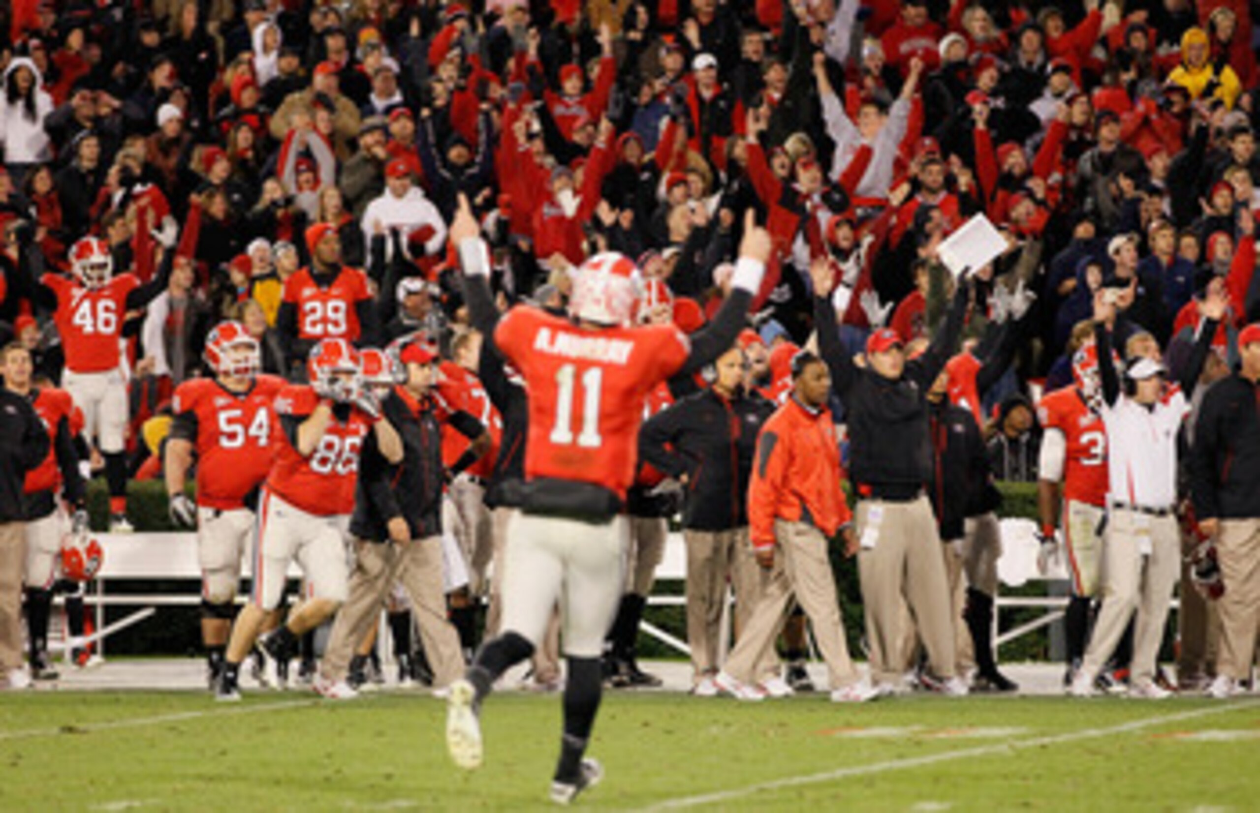 ATHENS, GA - NOVEMBER 27: The Georgia Bulldogs and quarterback Aaron Murray #11 react after a touchdown in the final minutes of play against the Georgia Tech Yellow Jackets at Sanford Stadium on November 27, 2010 in Athens, Georgia. (Photo by Kevin C. C ATHENS, GA - NOVEMBER 27: The Georgia Bulldogs and quarterback Aaron Murray #11 react after a touchdown in the final minutes of play against the Georgia Tech Yellow Jackets at Sanford Stadium on November 27, 2010 in Athens, Georgia. (Photo by Kevin C. C