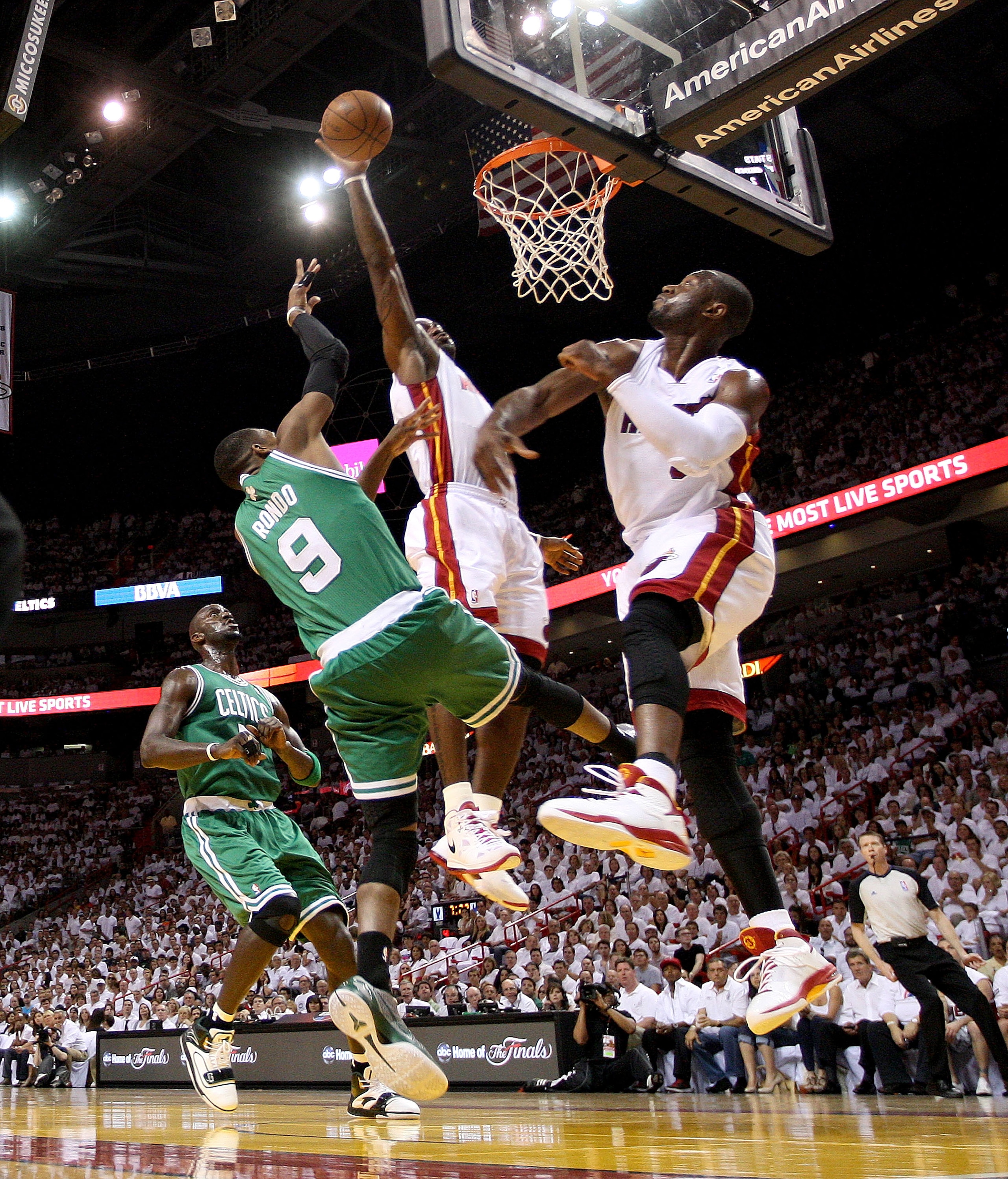MIAMI, FL - MAY 01:  LeBron James #6 and Dwyane Wade #3 of the Miami Heat block a shot from Rajon Rondo #9 of the Boston Celtics during game one of the Eastern Conference Semifinals of the 2011 NBA Playoffs at American Airlines Arena on May 1, 2011 in Mia