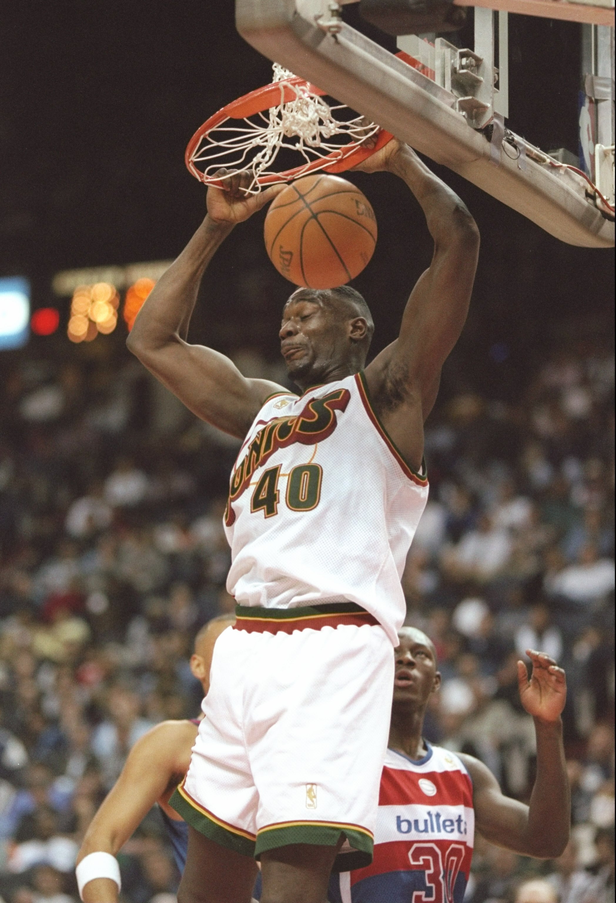 20 Nov 1996:  Forward Shawn Kemp of the Seattle Supersonics slam dunks the ball during a game against the Washington Bullets at the US Air Arena in Landover, Maryland.  The Supersonics won the game 115-110. Mandatory Credit: Doug Pensinger  /Allsport