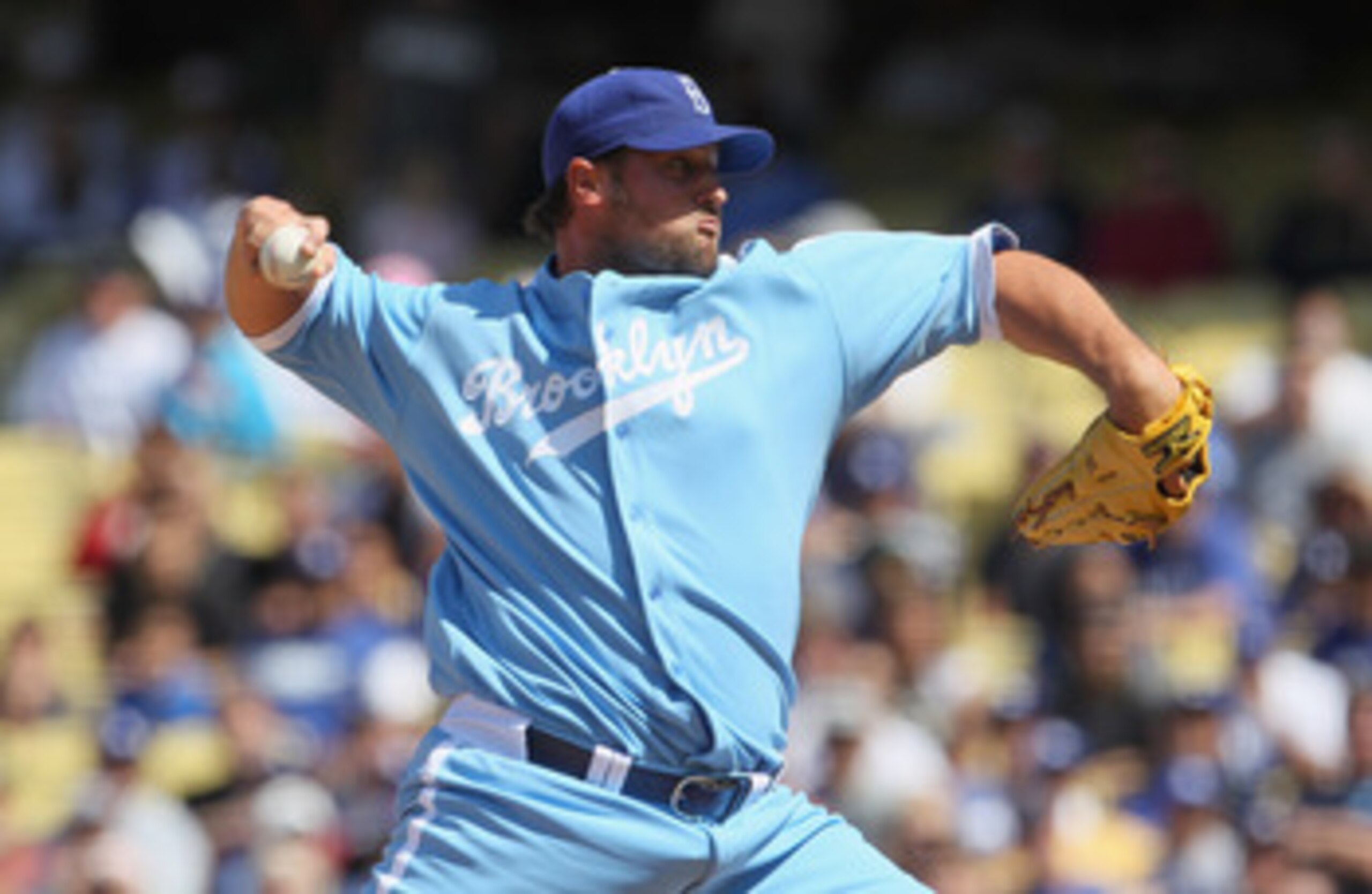 LOS ANGELES, CA - APRIL 21:  Jonathan Broxton #51 of the Los Angeles Dodgers pitches against the Atlanta Braves at Dodger Stadium on April 21, 2011 in Los Angeles, California.  (Photo by Jeff Gross/Getty Images)