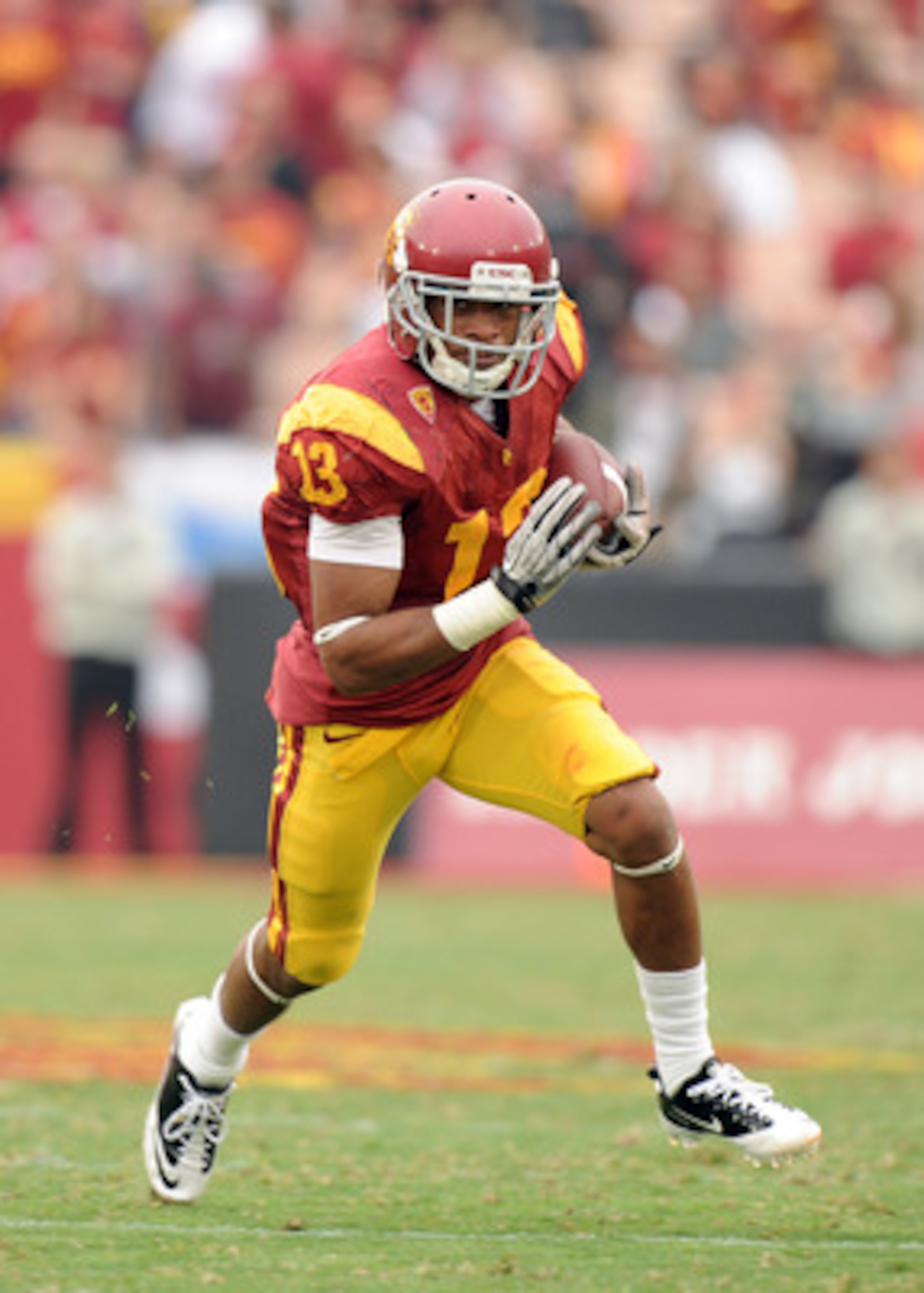 LOS ANGELES, CA - OCTOBER 16: Robert Woods #13 of the USC Trojans carries the ball during the game against the California Golden Bears at Los Angeles Memorial Coliseum on October 16, 2010 in Los Angeles, California. (Photo by Harry How/Getty Images) LOS ANGELES, CA - OCTOBER 16: Robert Woods #13 of the USC Trojans carries the ball during the game against the California Golden Bears at Los Angeles Memorial Coliseum on October 16, 2010 in Los Angeles, California. (Photo by Harry How/Getty Images)