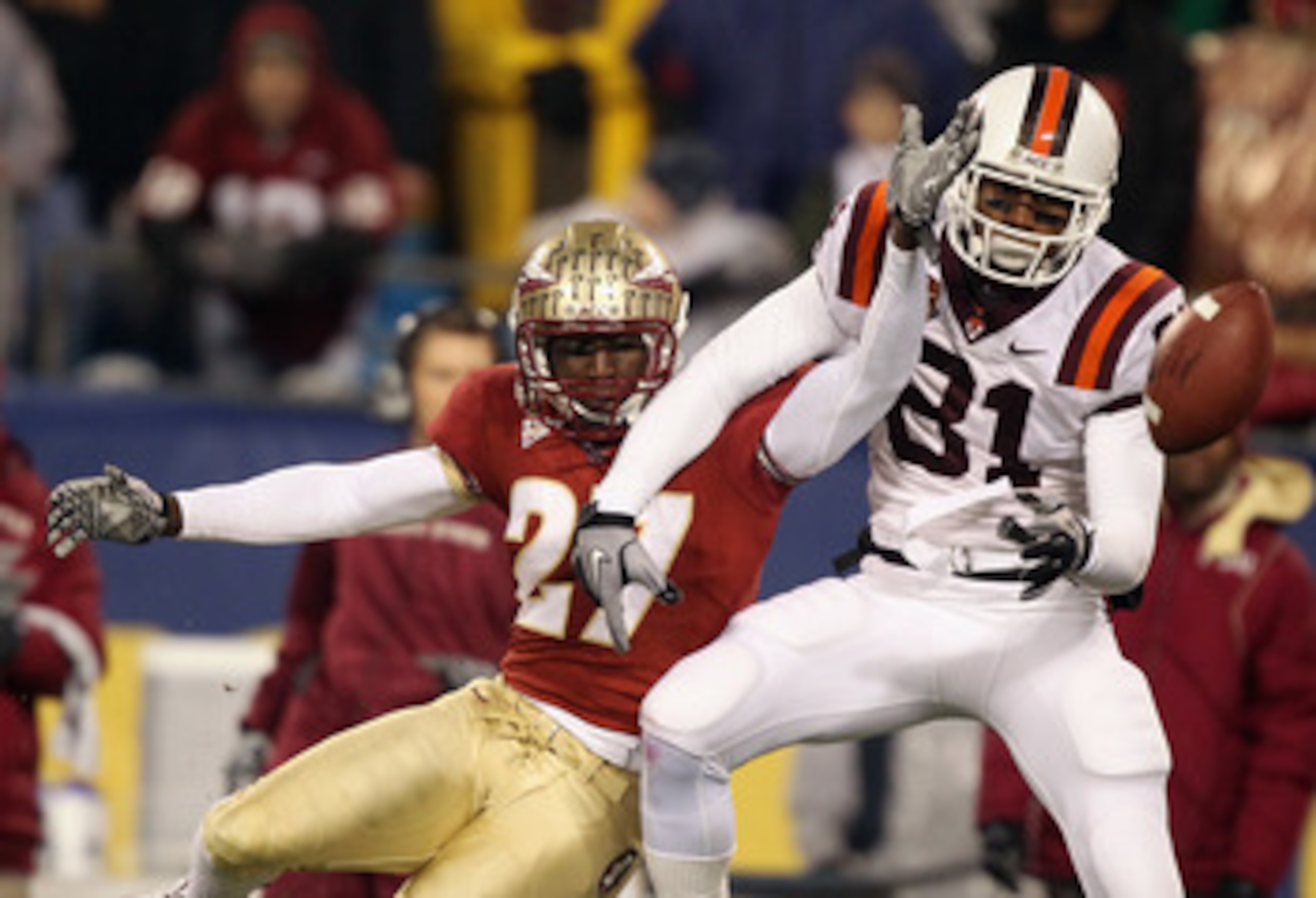 CHARLOTTE, NC - DECEMBER 04: Xavier Rhodes #27 of the Florida State Seminoles breaks up a pass to Jarrett Boykin #81 of the Virginia Tech Hokies during their game at Bank of America Stadium on December 4, 2010 in Charlotte, North Carolina. (Photo by Str CHARLOTTE, NC - DECEMBER 04: Xavier Rhodes #27 of the Florida State Seminoles breaks up a pass to Jarrett Boykin #81 of the Virginia Tech Hokies during their game at Bank of America Stadium on December 4, 2010 in Charlotte, North Carolina. (Photo by Str