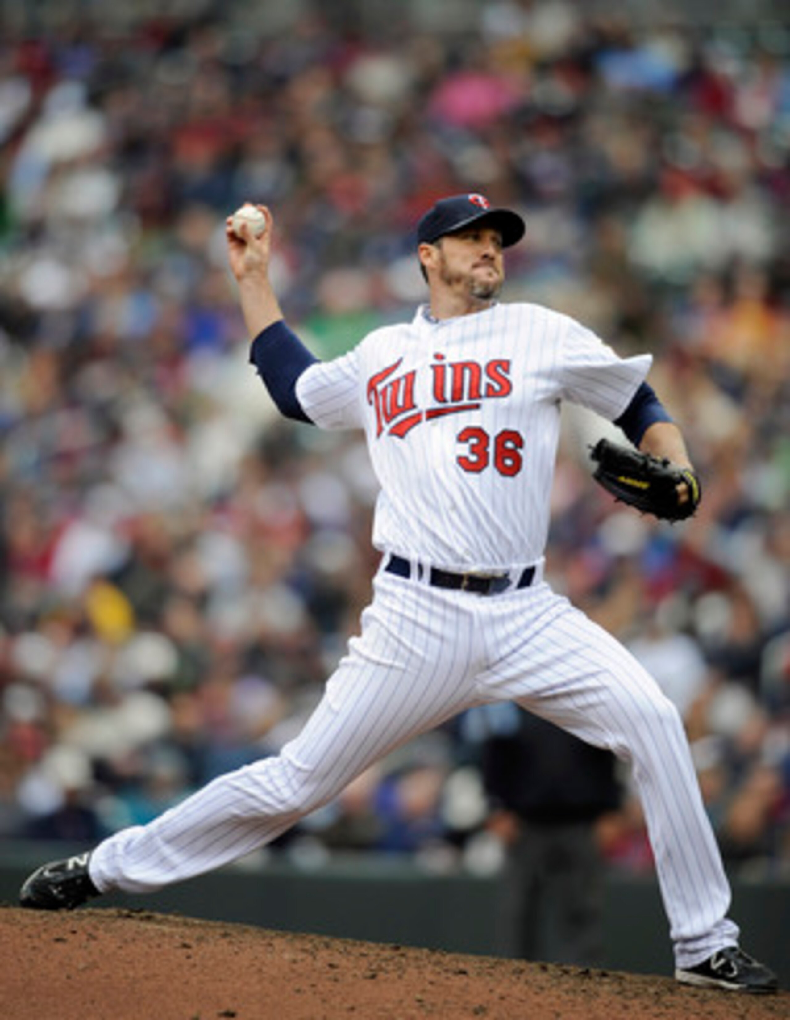 MINNEAPOLIS, MN - APRIL 23: Joe Nathan #36 of the Minnesota Twins pitches against the Cleveland Indians during the ninth inning of their game on April 23, 2011 at Target Field in Minneapolis, Minnesota. (Photo by Hannah Foslien/Getty Images)