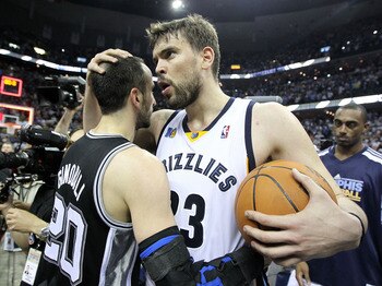 MEMPHIS, TN - APRIL 29:  Marc Gasol #33 of the Memphis Grizzlies hugs Manu Ginobili #20 of the San Antonio Spurs after the Grizzlies beat the San Antonio Spurs 99-91 in Game Six of the Western Conference Quarterfinals in the 2011 NBA Playoffs at FedExForu