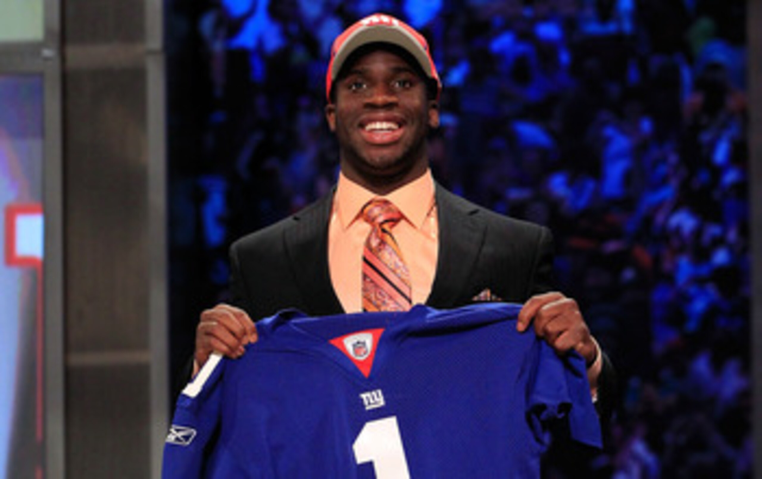 NEW YORK, NY - APRIL 28:  Prince Amukamara, #19 overall pick by the New York Giants, holds up a jersey on stage during the 2011 NFL Draft at Radio City Music Hall on April 28, 2011 in New York City.  (Photo by Chris Trotman/Getty Images)
