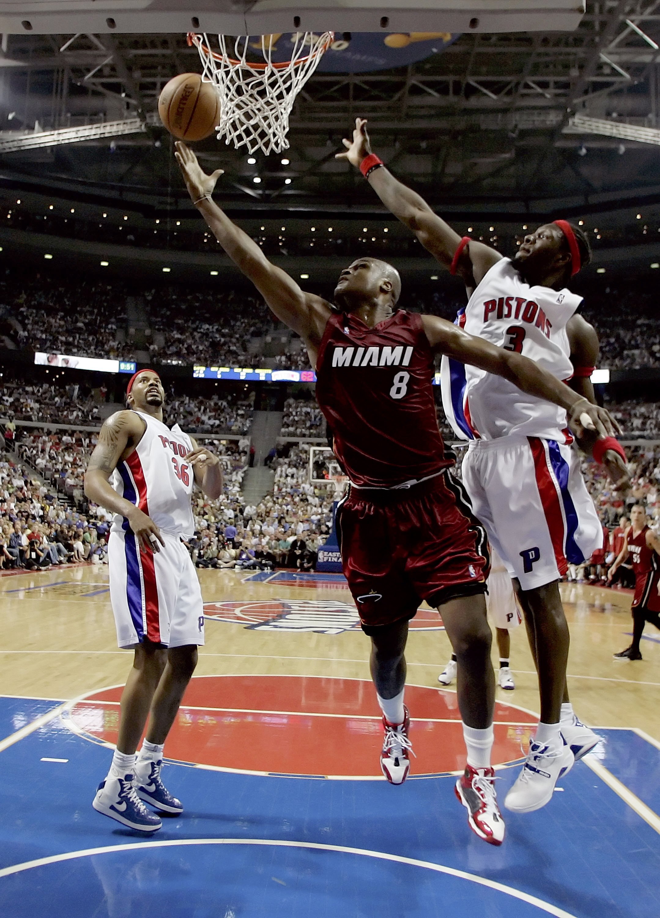 AUBURN HILLS, MI - MAY 31:  Antoine Walker #8 of the Miami Heat shoots a layup against Ben Wallace #3 of the Detroit Pistons in game five of the Eastern Conference Finals during the 2006 NBA Playoffs on May 31, 2006 at the Palace of Auburn Hills in Auburn