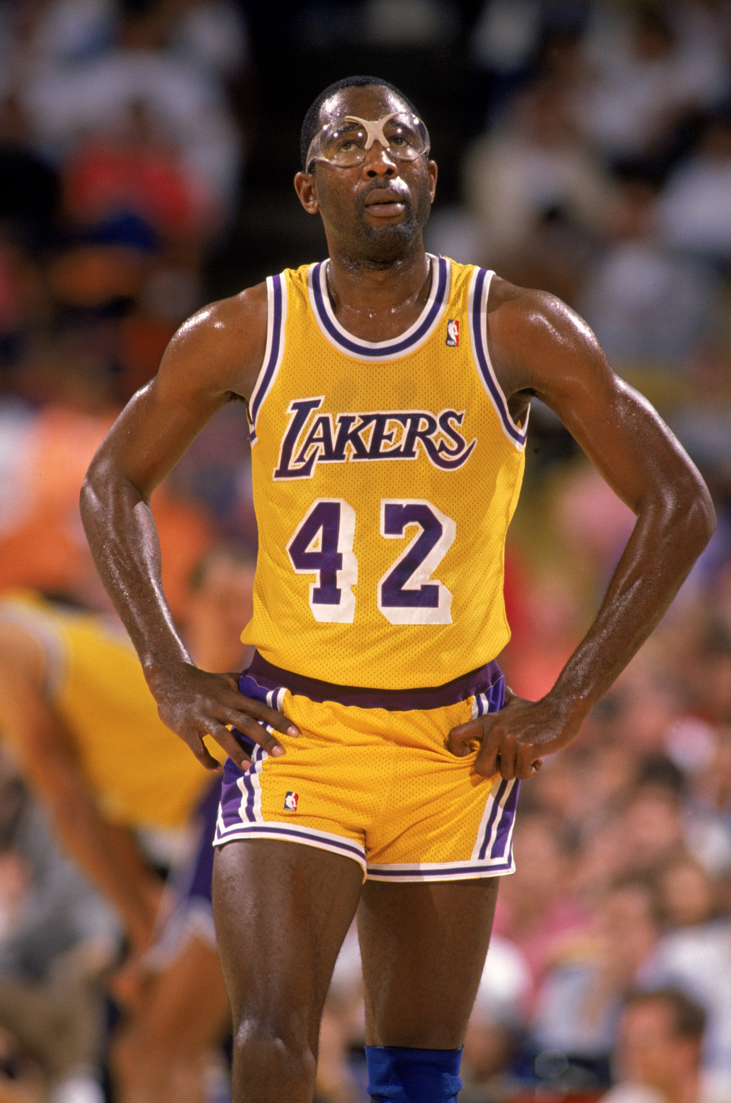 LOS ANGELES - 1989:  James Worthy #42 of the Los Angeles Lakers walks on the court during an NBA game at the Great Western Forum in Los Angeles, California in 1989. (Photo by: Mike Powell/Getty Images)
