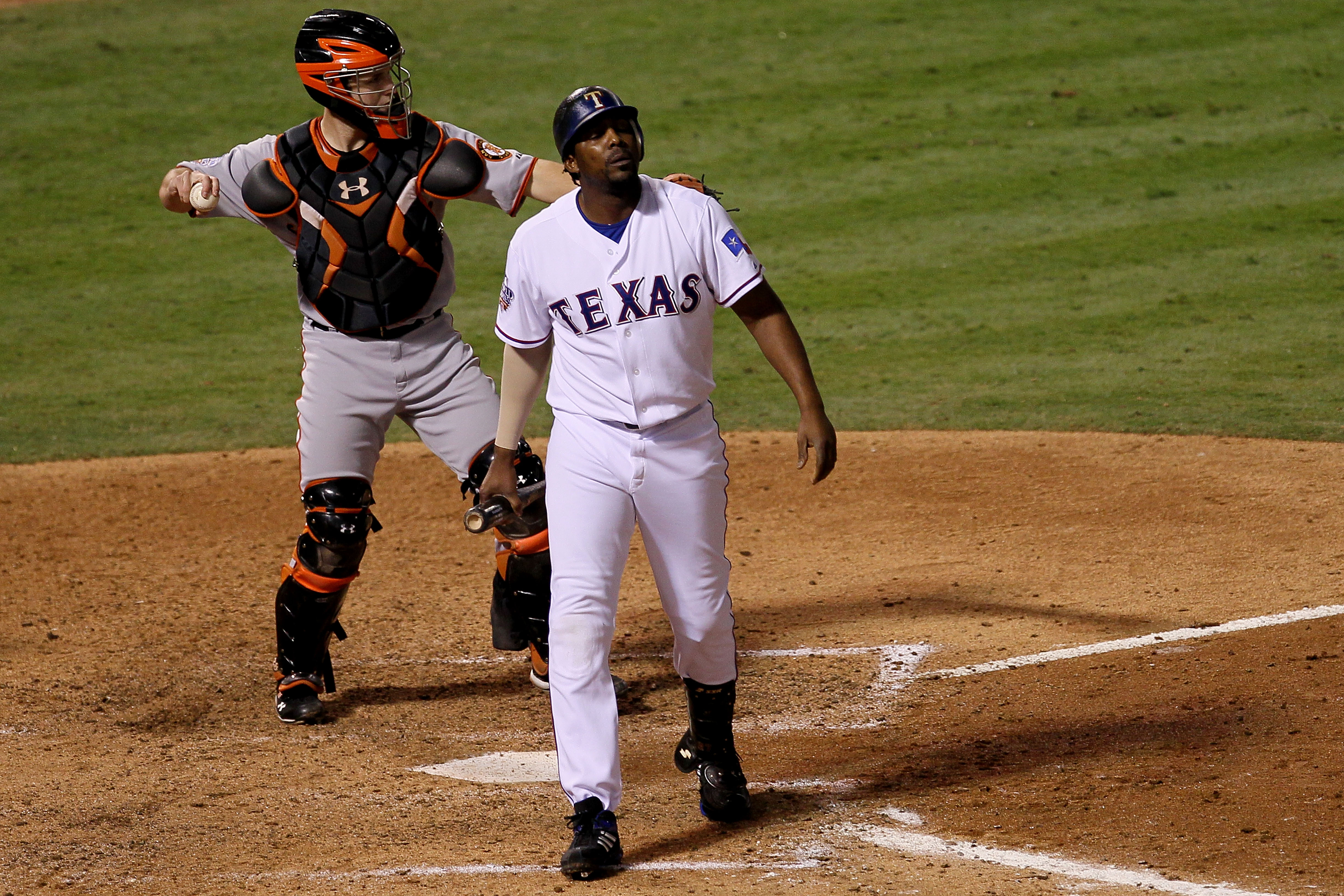 ARLINGTON, TX - OCTOBER 31:  Vladimir Guerrero #27 of the Texas Rangers reacts after he struck out in the seventh inning against the San Francisco Giants in Game Four of the 2010 MLB World Series at Rangers Ballpark in Arlington on October 31, 2010 in Arl