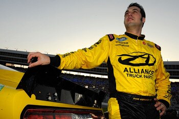 FORT WORTH, TX - APRIL 08:  Sam Hornish Jr., driver of the #12 Alliance Parts Dodge, stands on the grid prior to the NASCAR Nationwide Series O'Reilly Auto Parts 300 at Texas Motor Speedway on April 8, 2011 in Fort Worth, Texas.  (Photo by Jared C. Tilton