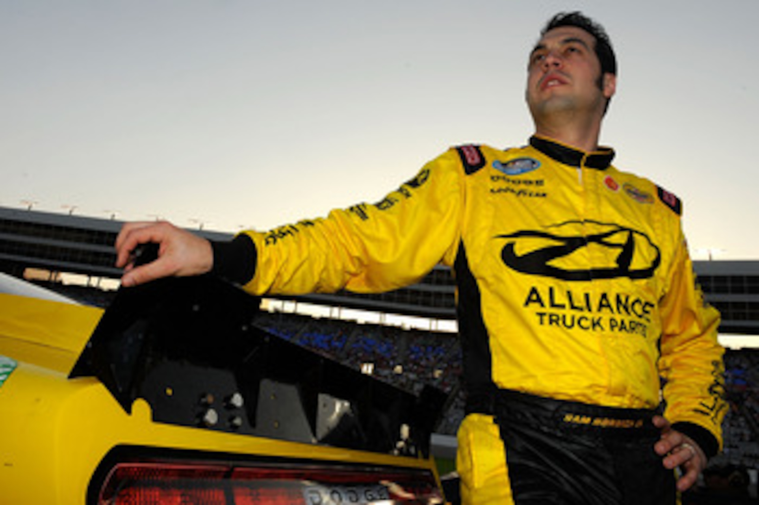 FORT WORTH, TX - APRIL 08:  Sam Hornish Jr., driver of the #12 Alliance Parts Dodge, stands on the grid prior to the NASCAR Nationwide Series O'Reilly Auto Parts 300 at Texas Motor Speedway on April 8, 2011 in Fort Worth, Texas.  (Photo by Jared C. Tilton