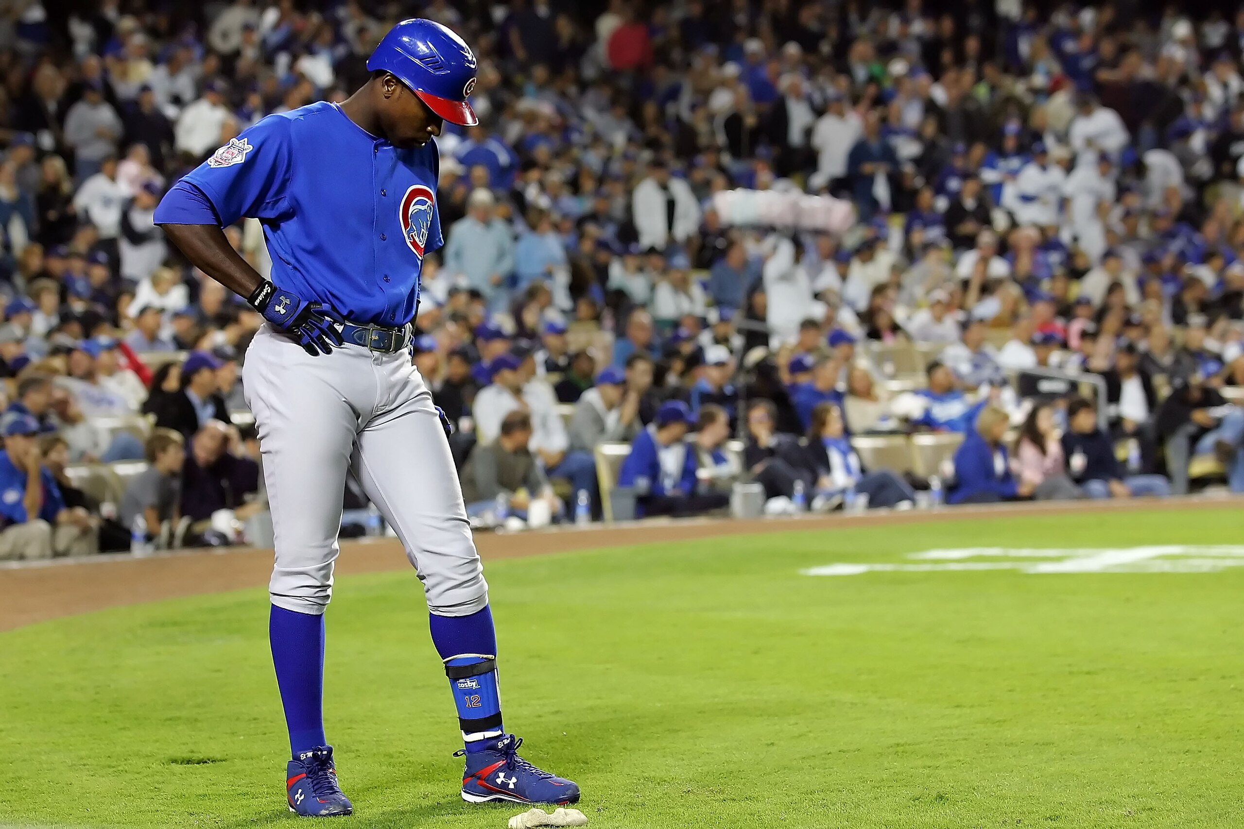 LOS ANGELES, CA - OCTOBER 04:  Alfonso Soriano #12 of the Chicago Cubs looks down while on deck against the Los Angeles Dodgers in Game Three of the NLDS during the 2008 MLB playoffs on October 4, 2008 at Dodger Stadium in Los Angeles, California.  (Photo