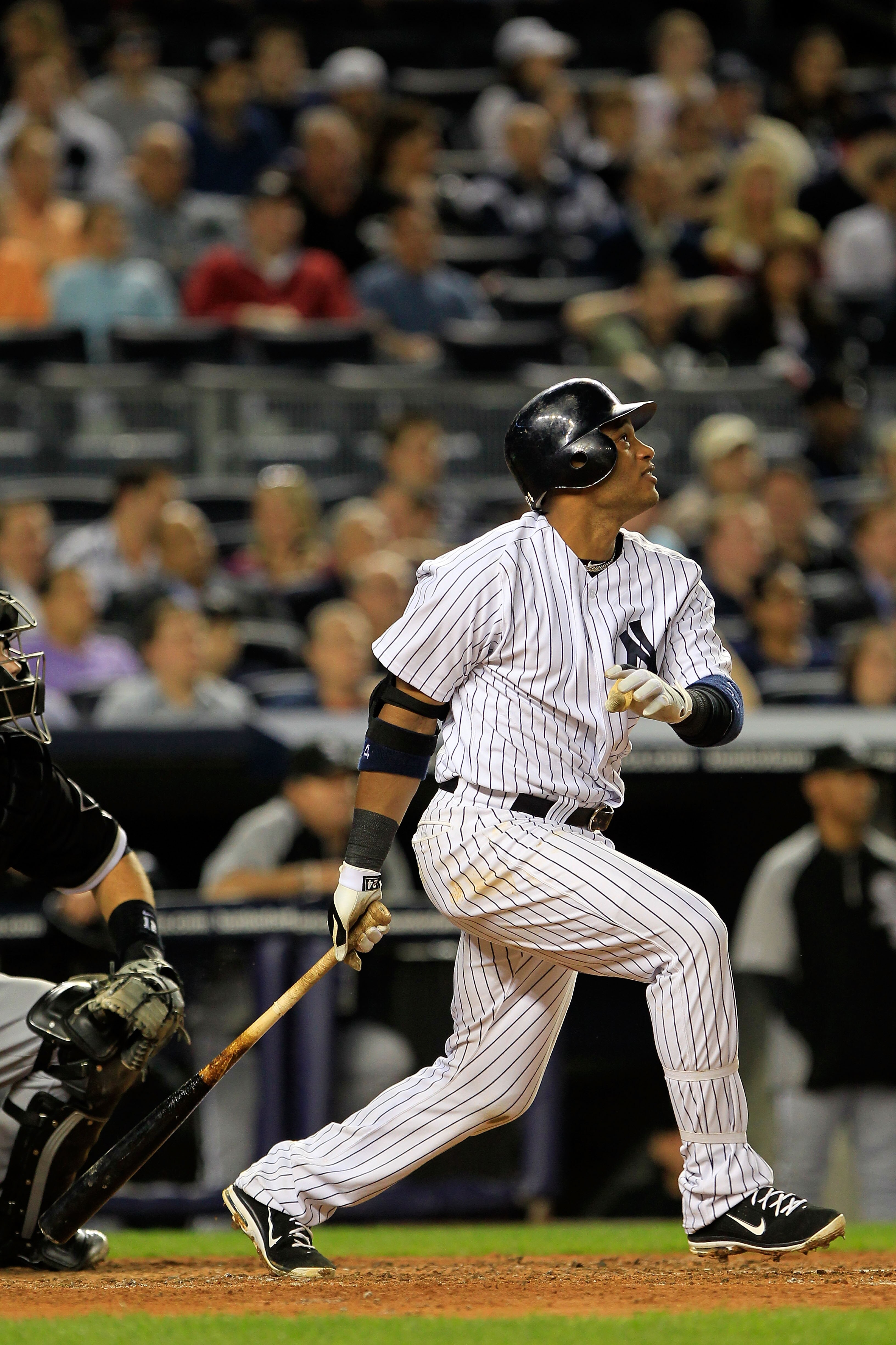 NEW YORK, NY - APRIL 26:  Robinson Cano #24 of the New York Yankees bats against the Chicago White Sox at Yankee Stadium on April 26, 2011 in the Bronx borough of New York City. The White Sox defeated the Yankees 3-2.  (Photo by Chris Trotman/Getty Images