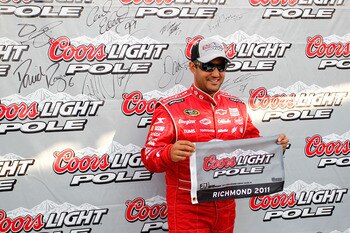 RICHMOND, VA - APRIL 29:  Juan Pablo Montoya, driver of the #42 Target Chevrolet, poses after setting the pole position during qualifying for the NASCAR Sprint Cup Series Crown Royal Presents The Matthew & Daniel Hansen 400 at Richmond International Racew