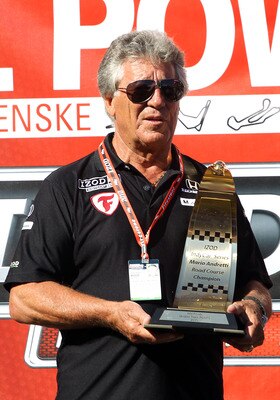SONOMA, CA - AUGUST 22:   Mario Andretti stands with Road Championship Trophy after the IZOD IndyCar Series Grand Prix of Sonoma at Infineon Raceway on August 22, 2010 in Sonoma, California.  (Photo by Christian Petersen/Getty Images)