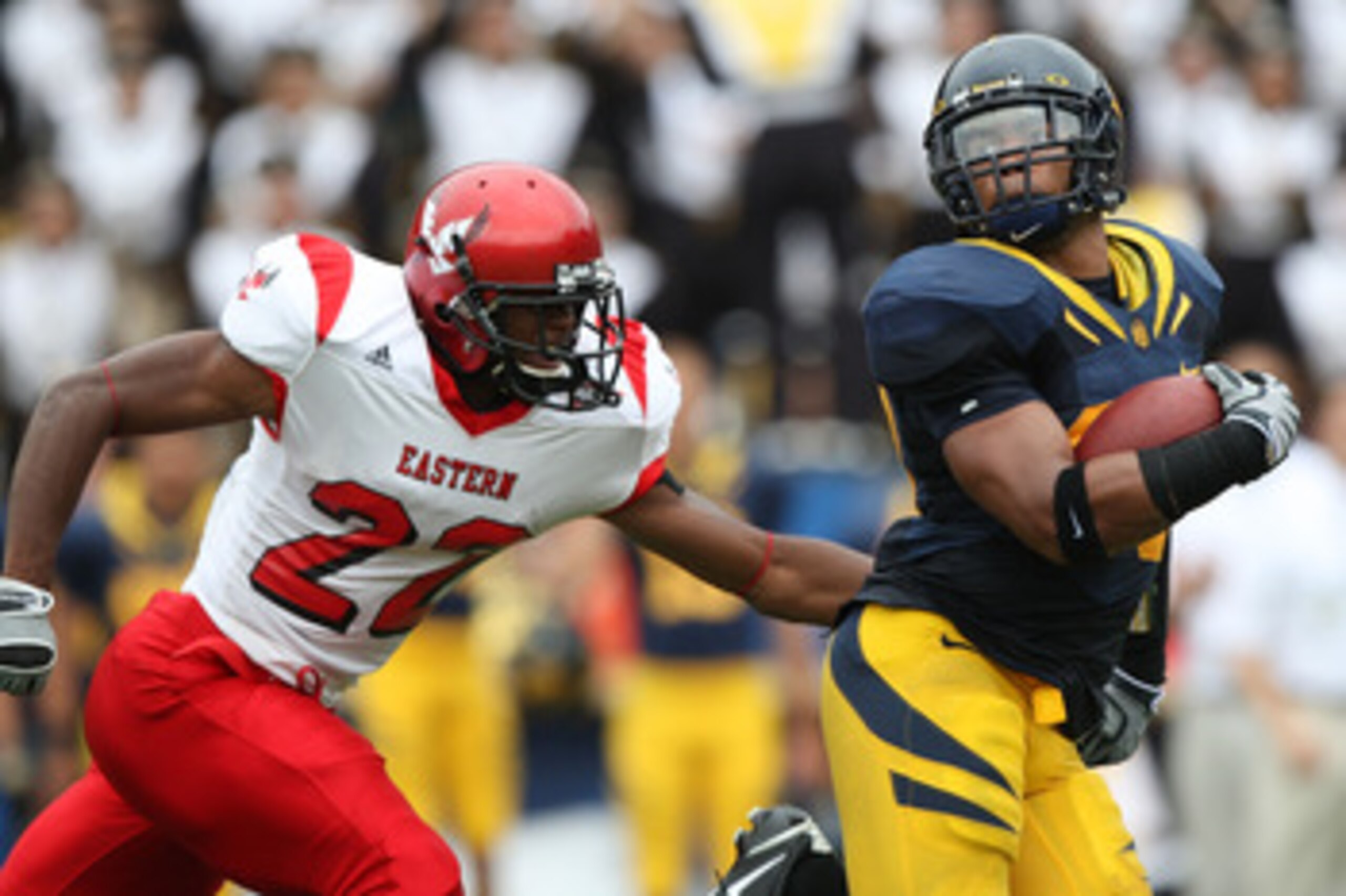 BERKELEY, CA - SEPTEMBER 12: Mychal Kendricks #30 of the California Golden Bears returns a fumble for 45 yards against Taiwan Jones #22 of the Eastern Washington Eagles at Memorial Stadium on September 12, 2009 in Berkeley, California. (Photo by Jed Jacob BERKELEY, CA - SEPTEMBER 12: Mychal Kendricks #30 of the California Golden Bears returns a fumble for 45 yards against Taiwan Jones #22 of the Eastern Washington Eagles at Memorial Stadium on September 12, 2009 in Berkeley, California. (Photo by Jed Jacob