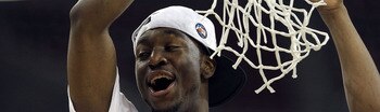 HOUSTON, TX - APRIL 04:  Kemba Walker #15 of the Connecticut Huskies cuts down the net after defeating the Butler Bulldogs to win the National Championship Game of the 2011 NCAA Division I Men's Basketball Tournament by a score of 53-41 at Reliant Stadium