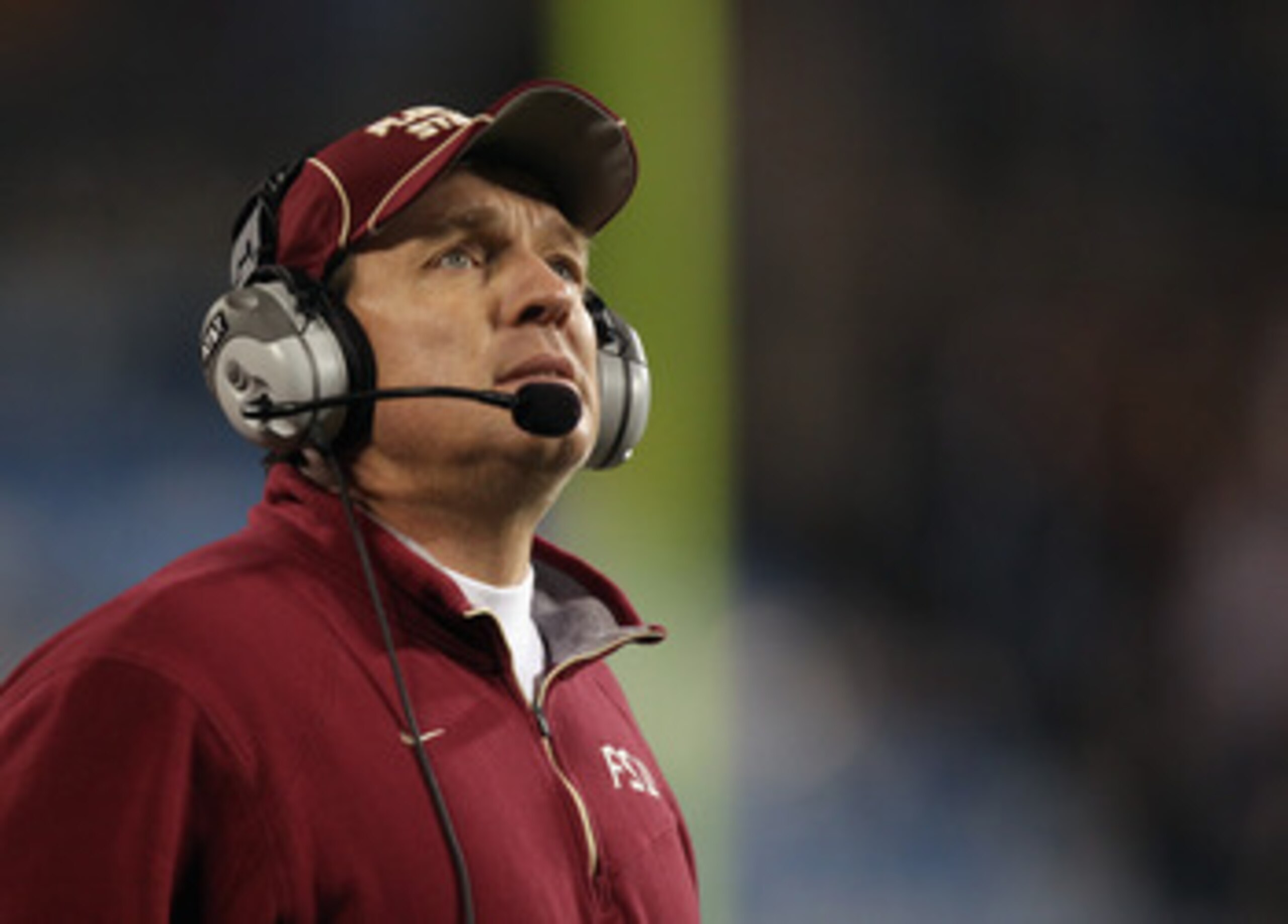 CHARLOTTE, NC - DECEMBER 04:  Head coach Jimbo Fisher of the Florida State Seminoles looks at the scoreboard against the Virginia Tech Hokies during their game at Bank of America Stadium on December 4, 2010 in Charlotte, North Carolina.  (Photo by Streete