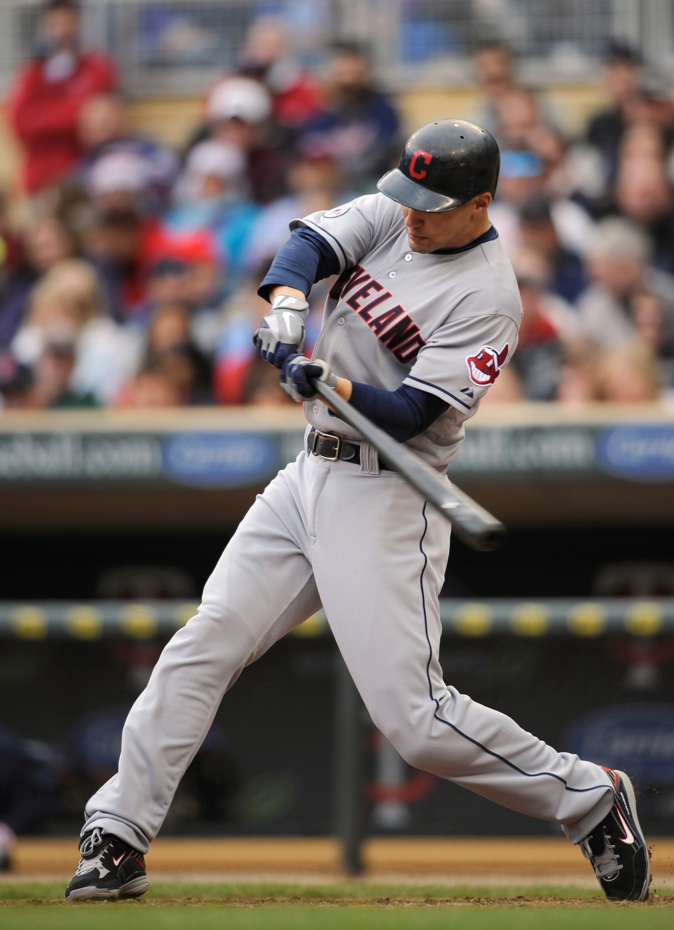 MINNEAPOLIS, MN - APRIL 23: Grady Sizemore #24 of the Cleveland Indians hits a two-run home run against the Minnesota Twins during the eighth inning of their game on April 23, 2011 at Target Field in Minneapolis, Minnesota. (Photo by Hannah Foslien/Getty