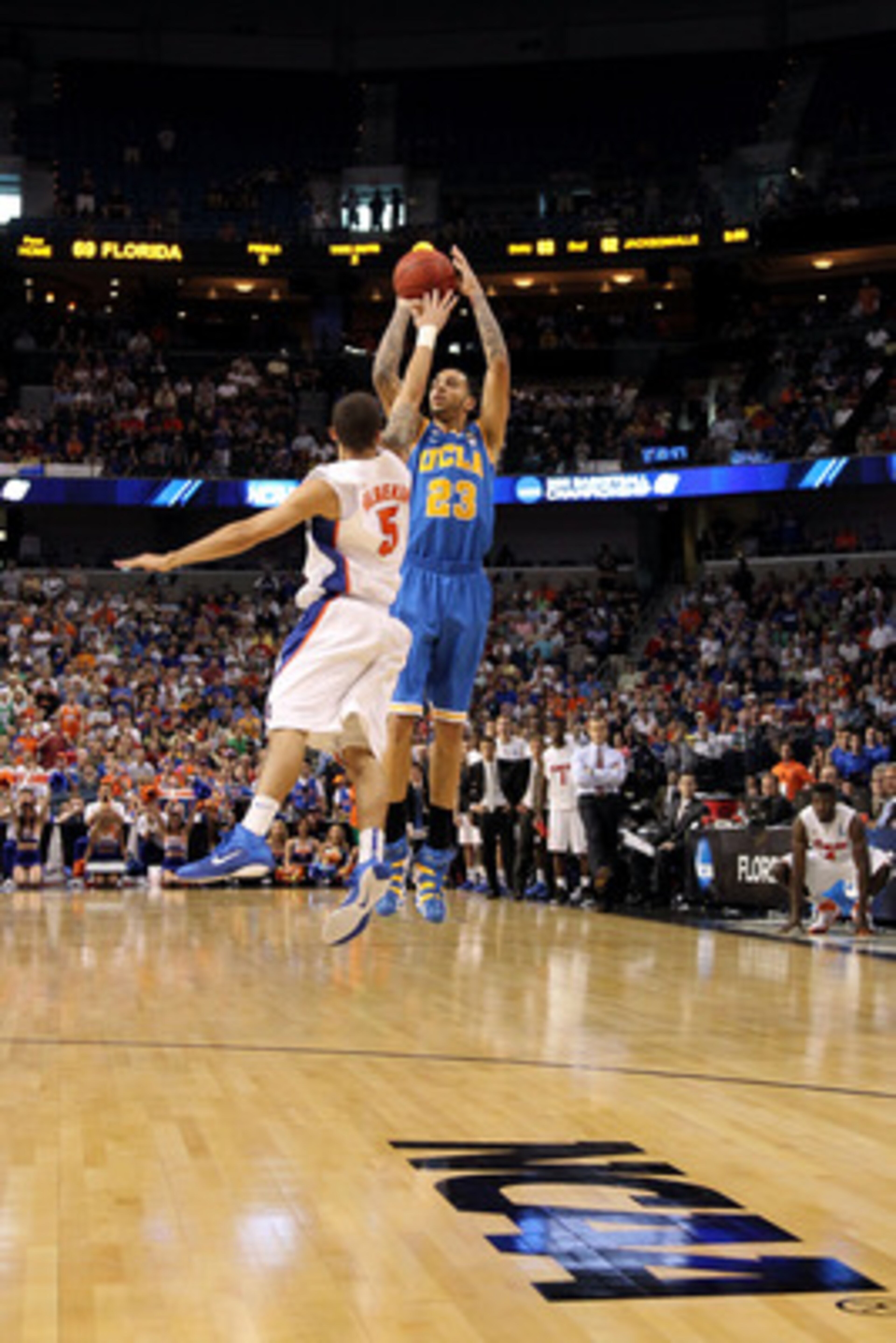 TAMPA, FL - MARCH 19: Tyler Honeycutt #23 of the UCLA Bruins attempts a shot against Scottie Wilbekin #5 of the Florida Gators during the third round of the 2011 NCAA men's basketball tournament at St. Pete Times Forum on March 19, 2011 in Tampa, Florida TAMPA, FL - MARCH 19: Tyler Honeycutt #23 of the UCLA Bruins attempts a shot against Scottie Wilbekin #5 of the Florida Gators during the third round of the 2011 NCAA men's basketball tournament at St. Pete Times Forum on March 19, 2011 in Tampa, Florida
