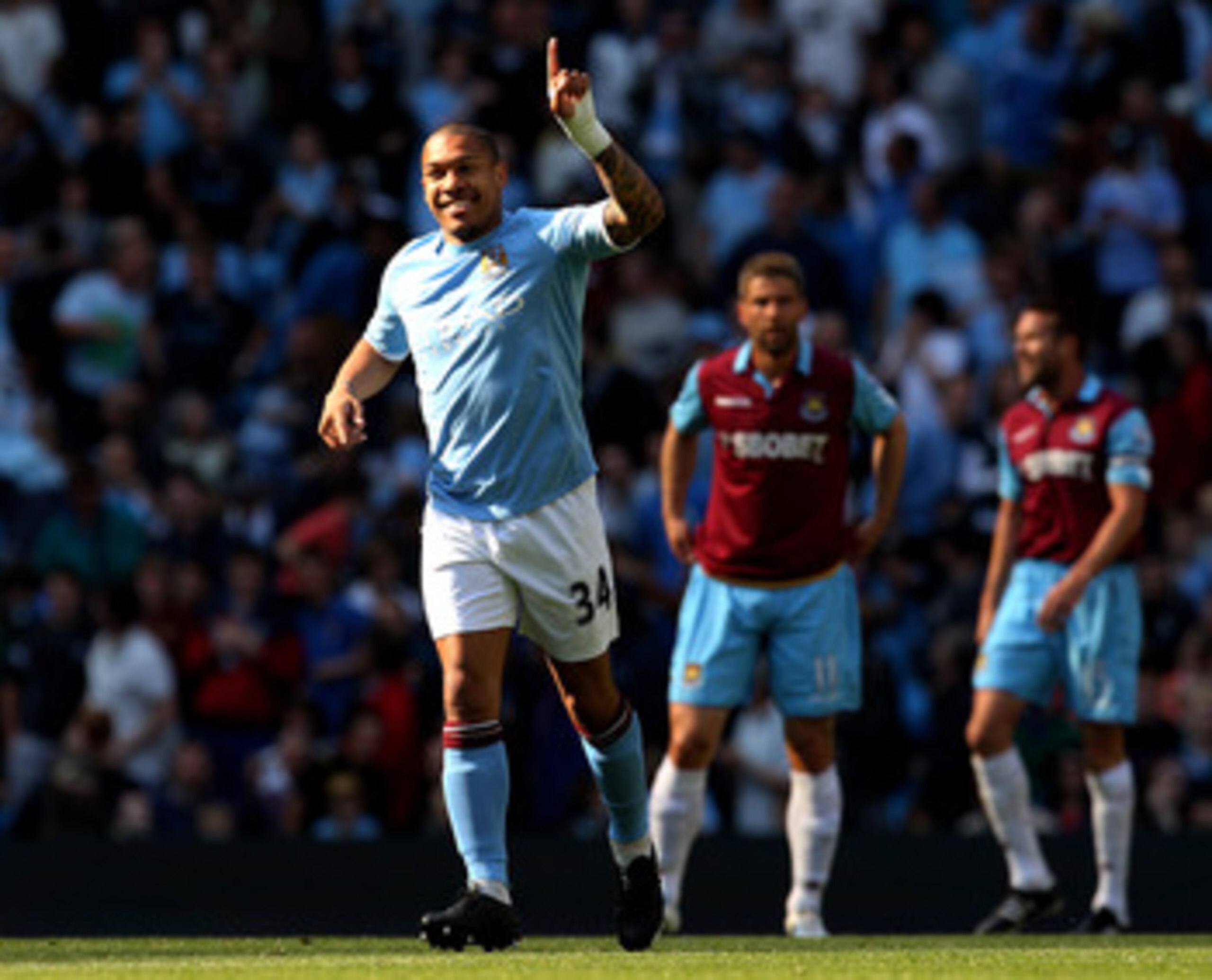 MANCHESTER, ENGLAND - MAY 01:  Nigel de Jong of Manchester City celebrates scoring the opening goal during the Barclays Premier League match between Manchester City and West Ham United at the City of Manchester Stadium on May 1, 2011 in Manchester, Englan