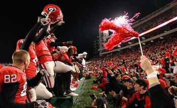 ATHENS, GA - NOVEMBER 27:  The Georgia Bulldogs celebrate their 42-34 win over the Georgia Tech Yellow Jackets at Sanford Stadium on November 27, 2010 in Athens, Georgia.  (Photo by Kevin C. Cox/Getty Images)