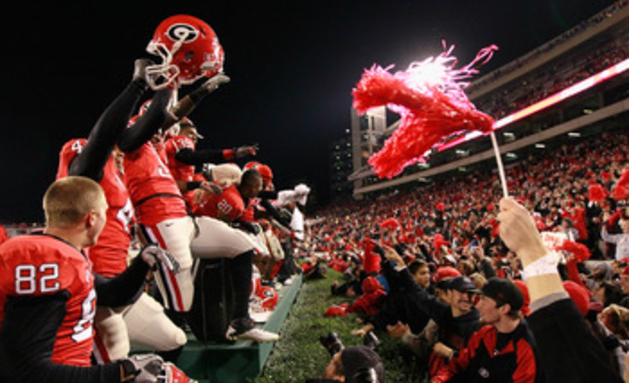 ATHENS, GA - NOVEMBER 27:  The Georgia Bulldogs celebrate their 42-34 win over the Georgia Tech Yellow Jackets at Sanford Stadium on November 27, 2010 in Athens, Georgia.  (Photo by Kevin C. Cox/Getty Images)