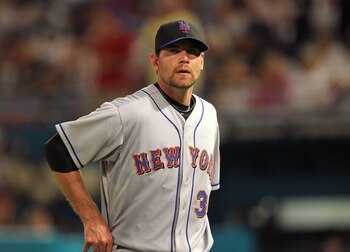 MIAMI GARDENS, FL - APRIL 01:  Mike Pelfrey #34 of the New York Mets walks off the mound during opening day against the Florida Marlins at Sun Life Stadium on April 1, 2011 in Miami Gardens, Florida.  (Photo by Mike Ehrmann/Getty Images)