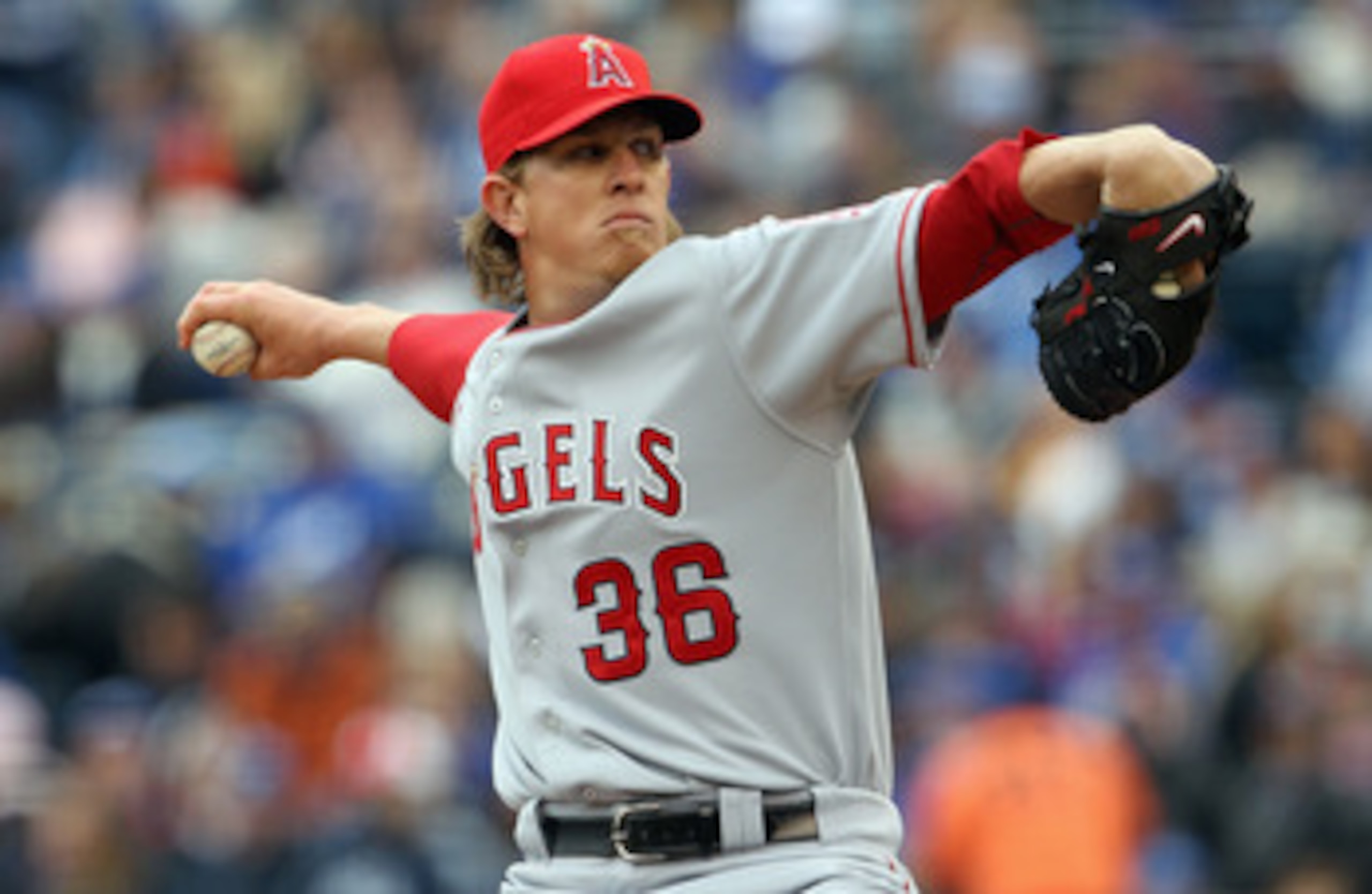 KANSAS CITY, MO - MARCH 31:  Starting pitcher Jered Weaver #36 of the Los Angeles Angels of Anaheim delivers his first pitch during the 1st inning of the opening day game against the Kansas City Royals at Kauffman Stadium on March 31, 2011 in Kansas City,