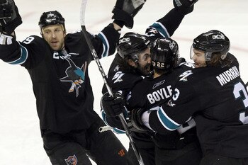 SAN JOSE, CA - APRIL 29:  Benn Ferriero #78 of the San Jose Sharks is congratulated by teammates after he scored the winning goal in overtime of their game against the Detroit Red Wings in Game One of the Western Conference Semifinals during the 2011 NHL