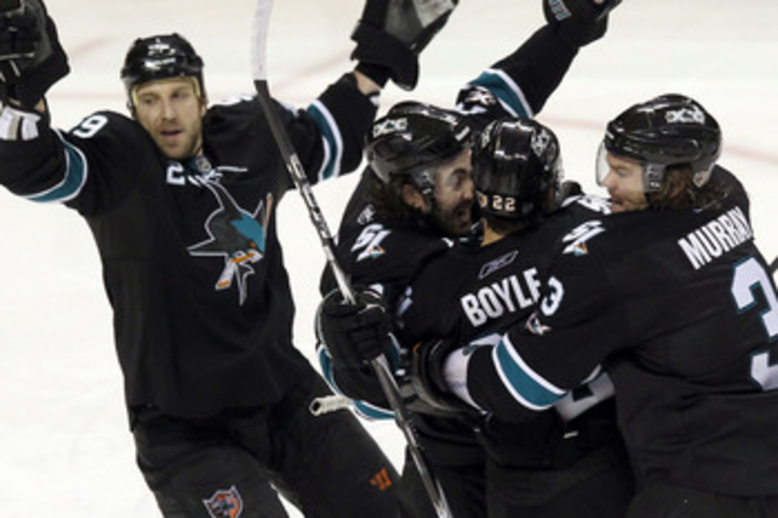 SAN JOSE, CA - APRIL 29:  Benn Ferriero #78 of the San Jose Sharks is congratulated by teammates after he scored the winning goal in overtime of their game against the Detroit Red Wings in Game One of the Western Conference Semifinals during the 2011 NHL