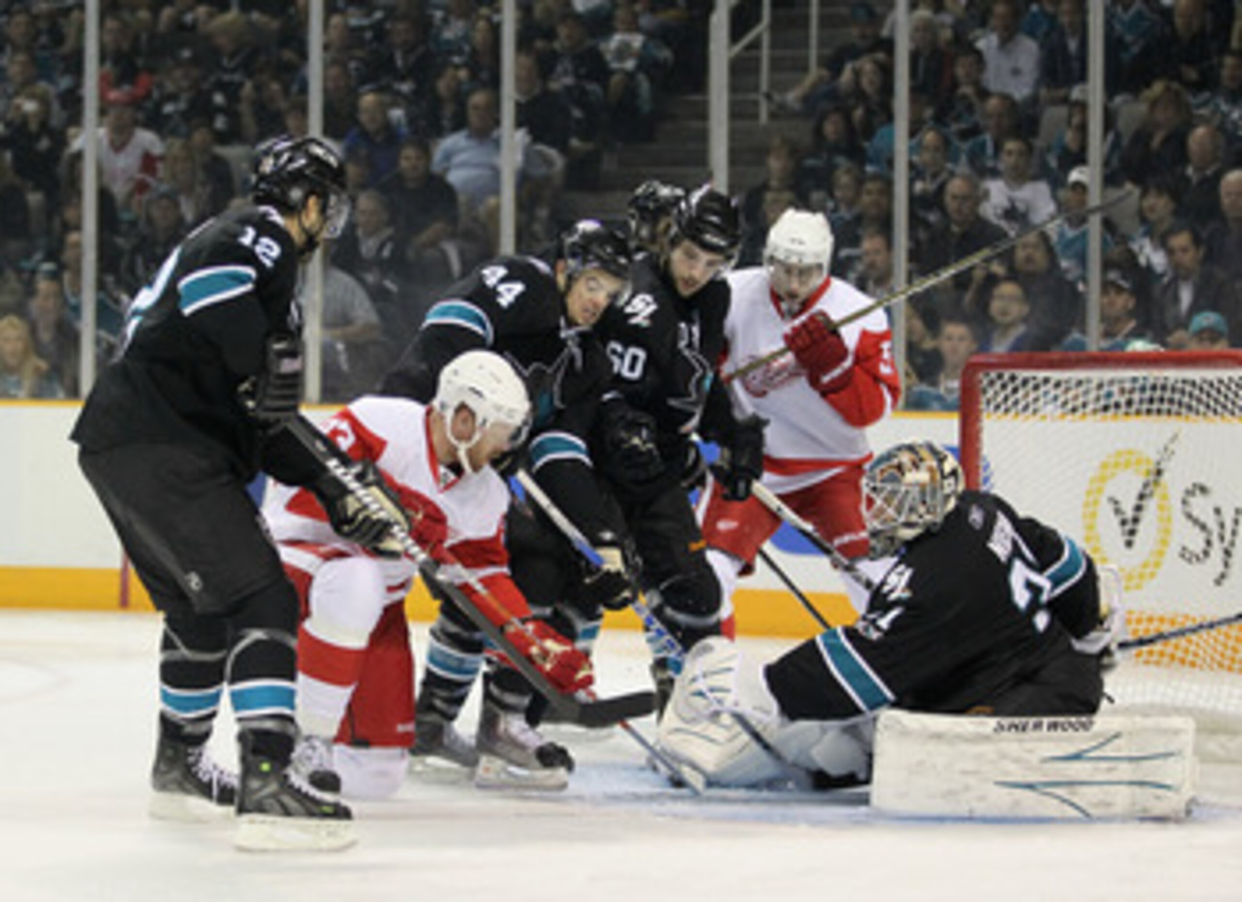 SAN JOSE, CA - MAY 01:  Antti Niemi #31 of the San Jose Sharks and the San Jose defense stop Johan Franzen #93 of the Detroit Red Wings from scoring in Game Two of the Western Conference Semifinals during the 2011 NHL Stanley Cup Playoffs at HP Pavilion o
