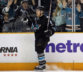 SAN JOSE, CA - APRIL 29:  Joe Pavelski #8 of the San Jose Sharks celebrates after he made a goal in the third period to tie their game against the Detroit Red Wings in Game One of the Western Conference Semifinals during the 2011 NHL Stanley Cup Playoffs