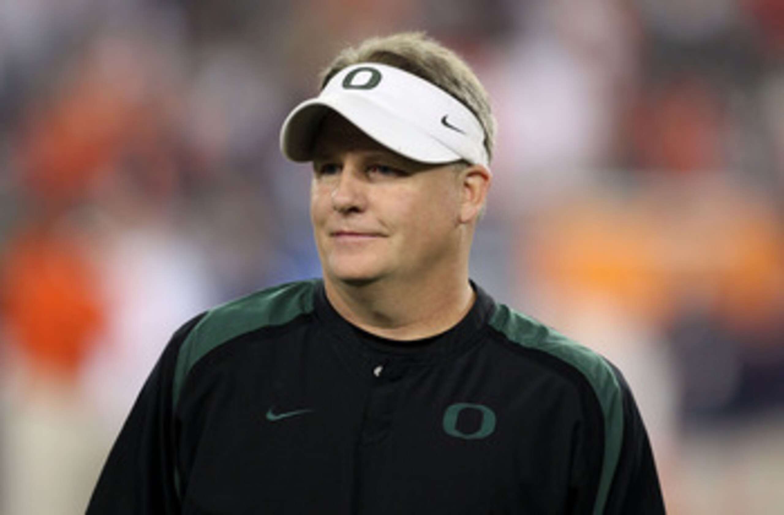 GLENDALE, AZ - JANUARY 10:  Head coach Chip Kelly of the Oregon Ducks looks on during their 22-19 loss to the Auburn Tigers during the Tostitos BCS National Championship Game at University of Phoenix Stadium on January 10, 2011 in Glendale, Arizona.  (Pho