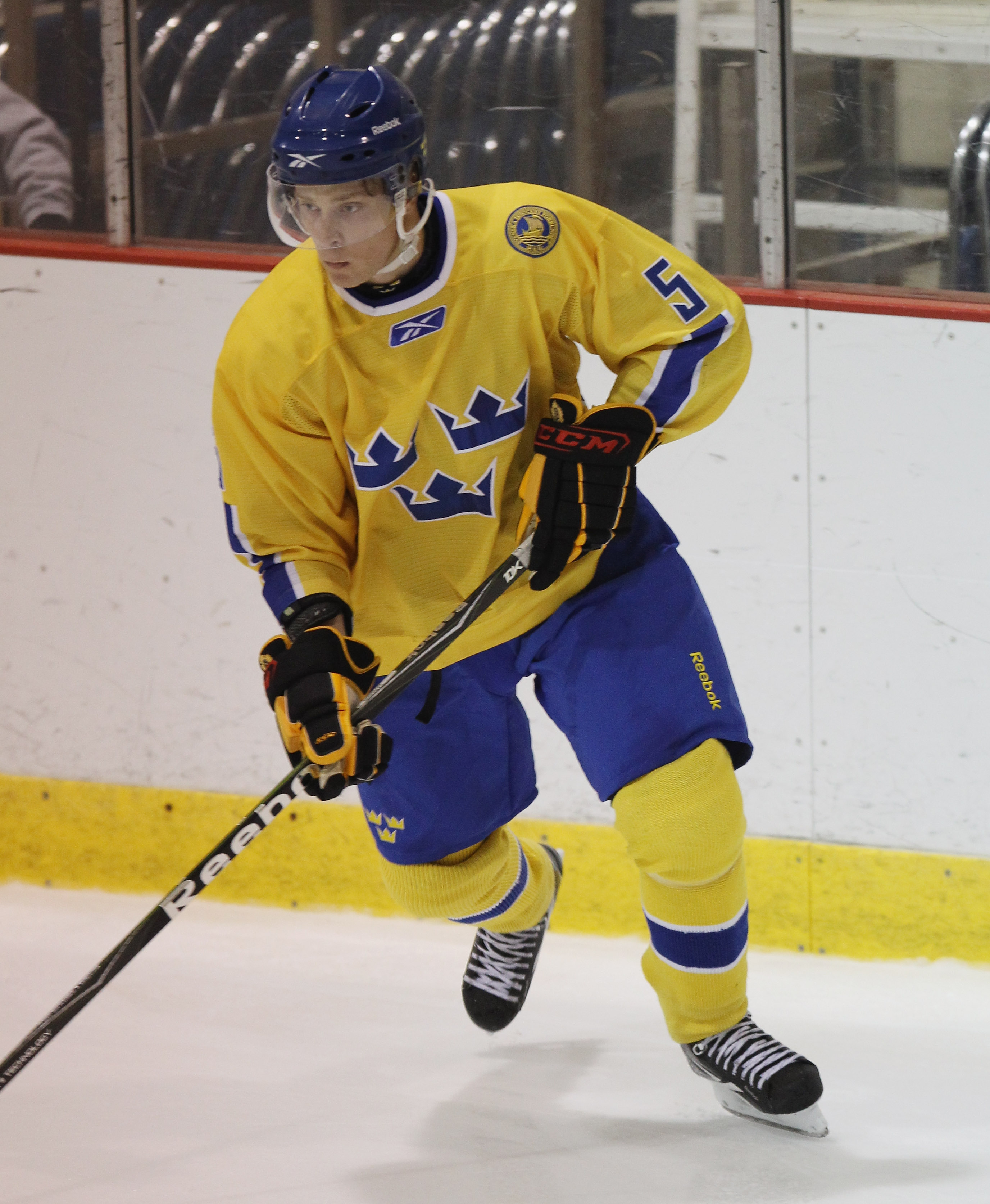 LAKE PLACID, NY - AUGUST 03:  Adam Larsson #5 of Team Sweden skates against Team USA at the USA Hockey National Evaluation Camp on August 3, 2010 in Lake Placid, New York. Team USA defeated Team Sweden 6-3.  (Photo by Bruce Bennett/Getty Images)