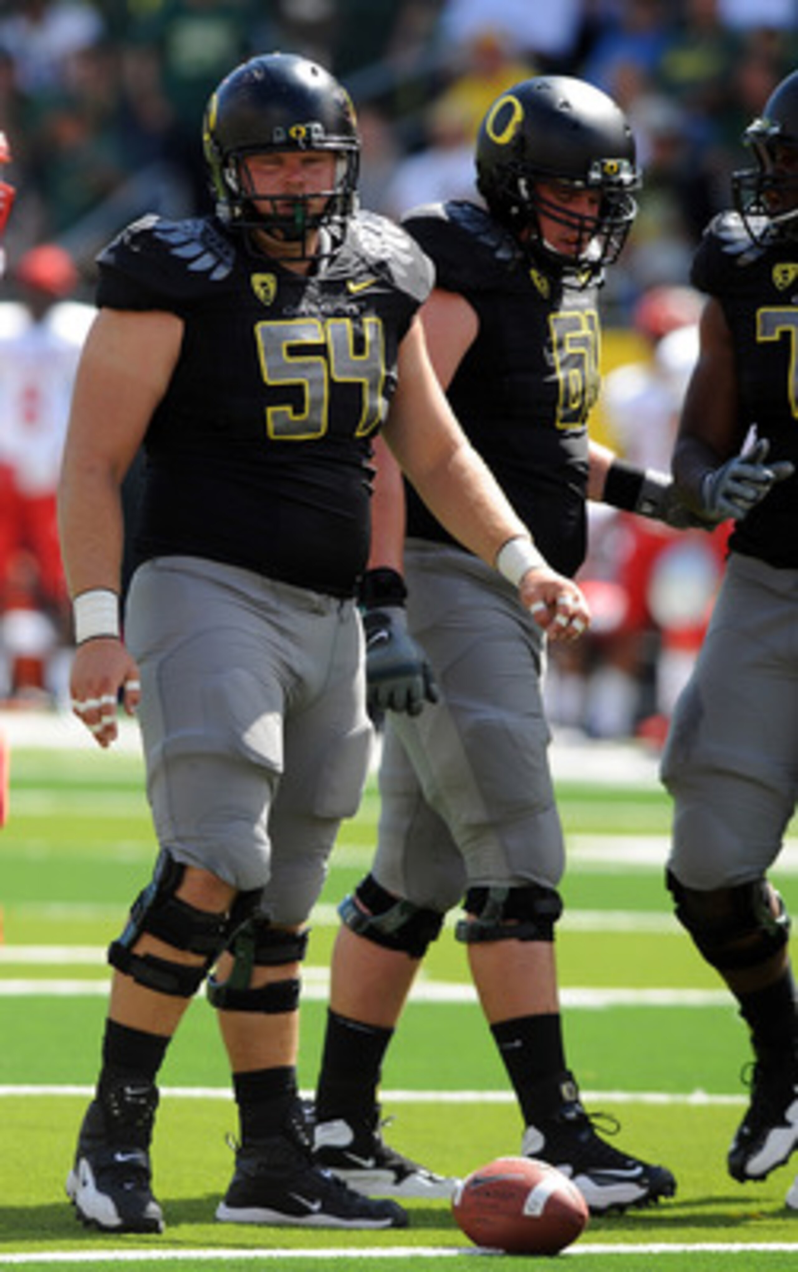 EUGENE, OR - SEPTEMBER 04:  Center Jordan Holmes #54 of the Oregon Ducks gets set at the line of scrimmage in the second quarter of the game against the New Mexico Lobos at Autzen Stadium on September 4, 2010 in Eugene, Oregon. Oregon won the game 72-0. (