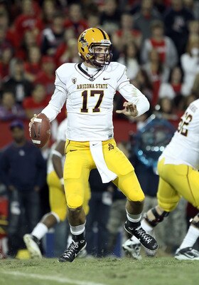 TUCSON, AZ - DECEMBER 02:  Quarterback Brock Osweiler #17 of the Arizona State Sun Devils scrambles with the football during the college football game at Arizona Stadium on December 2, 2010 in Tucson, Arizona. The Sun Devils defeated the Wildcats 30-29 in